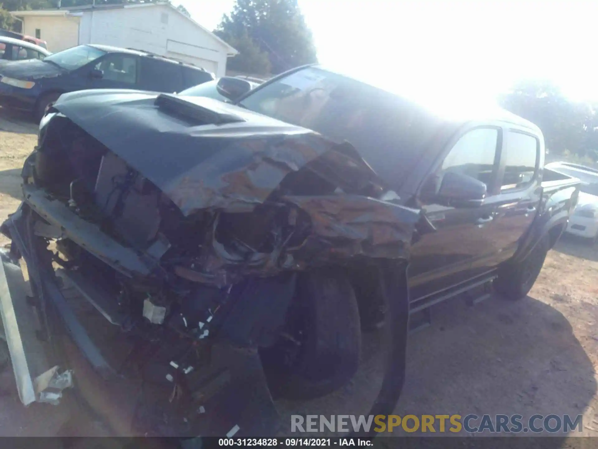 2 Photograph of a damaged car 5TFCZ5AN1MX244697 TOYOTA TACOMA 4WD 2021