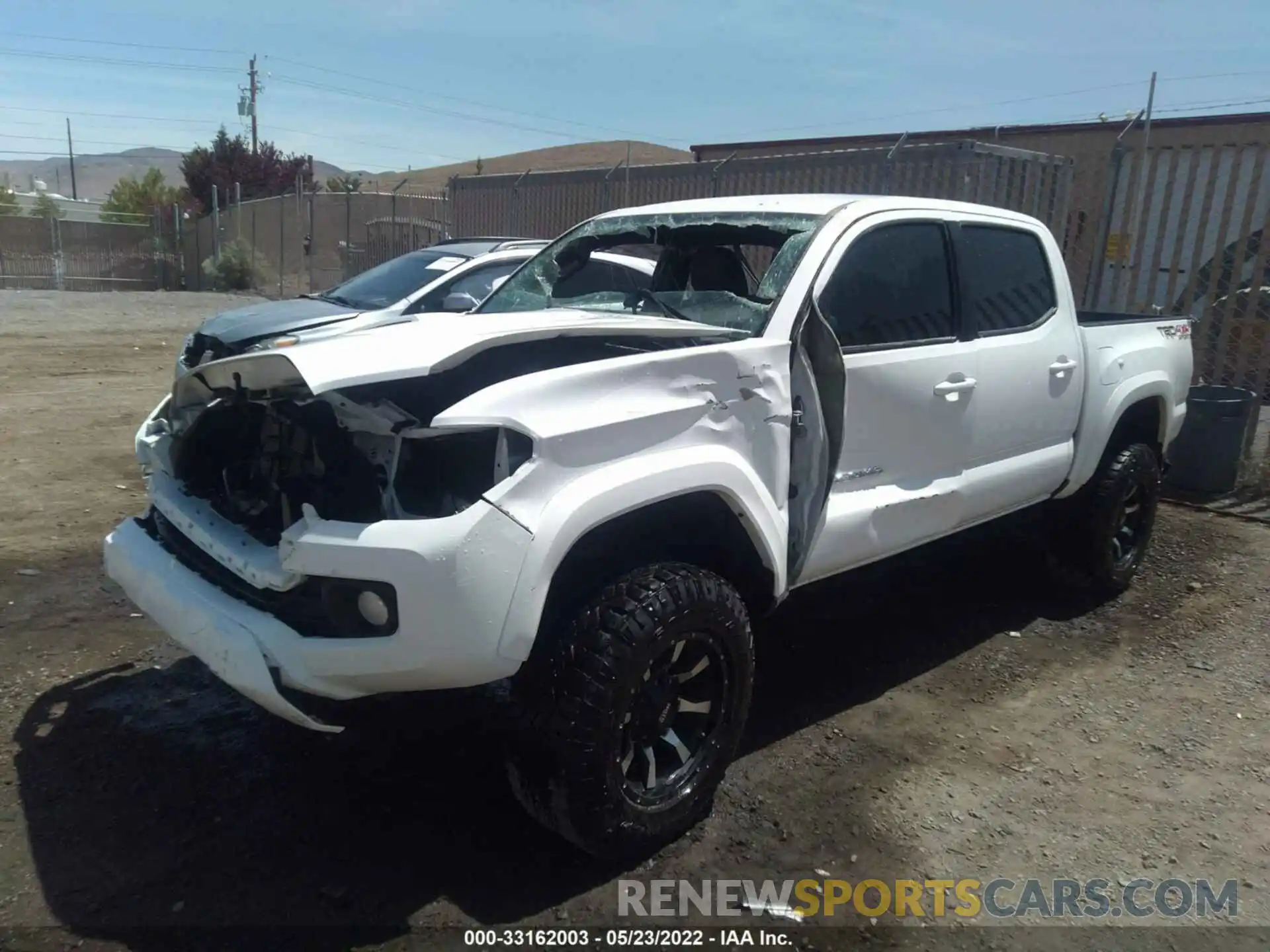 2 Photograph of a damaged car 5TFCZ5AN1MX254050 TOYOTA TACOMA 4WD 2021