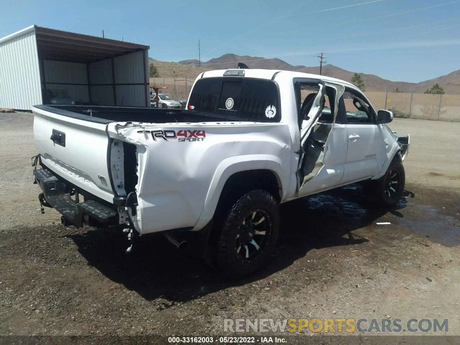 4 Photograph of a damaged car 5TFCZ5AN1MX254050 TOYOTA TACOMA 4WD 2021