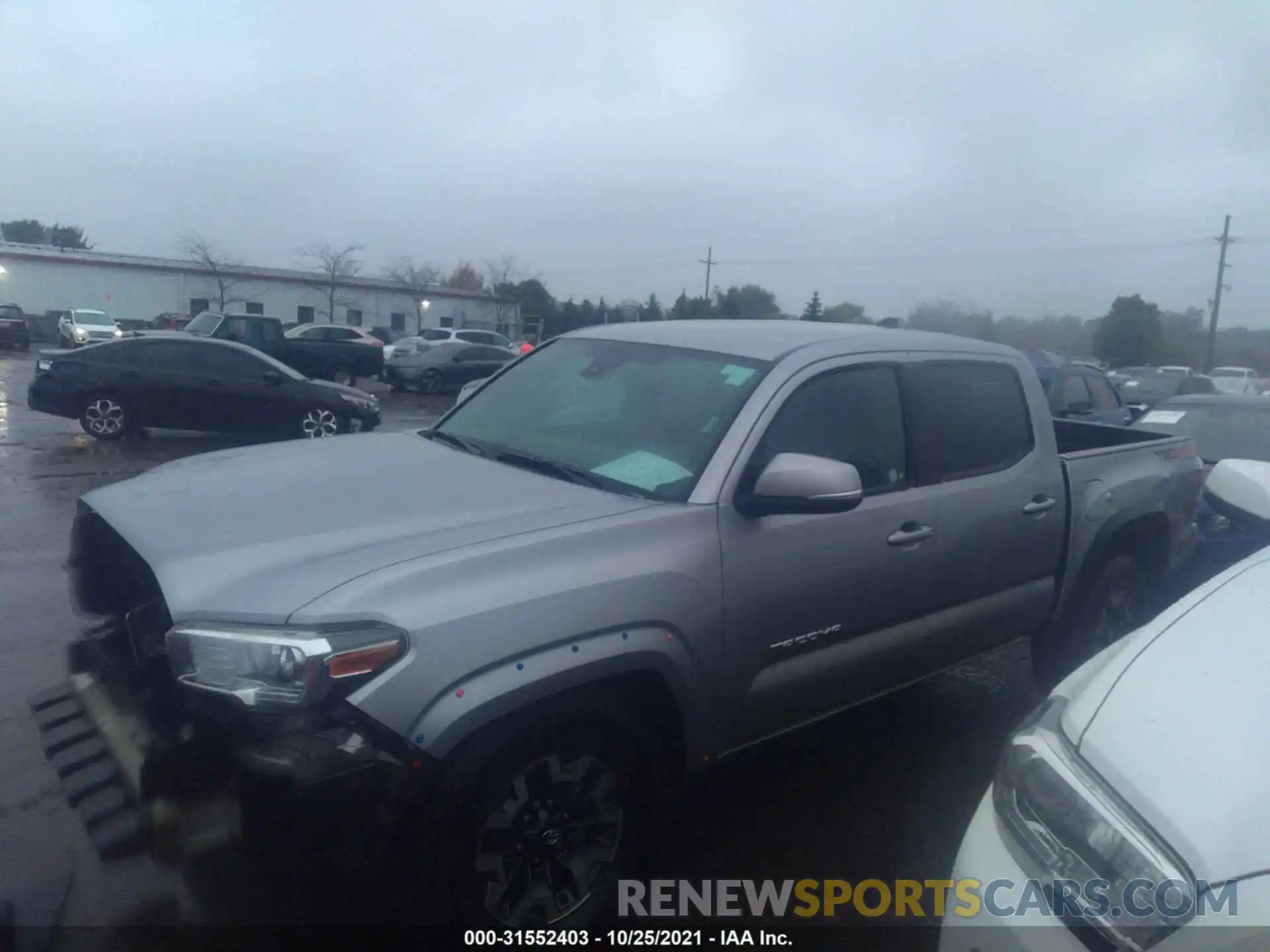 2 Photograph of a damaged car 5TFCZ5AN1MX258938 TOYOTA TACOMA 4WD 2021