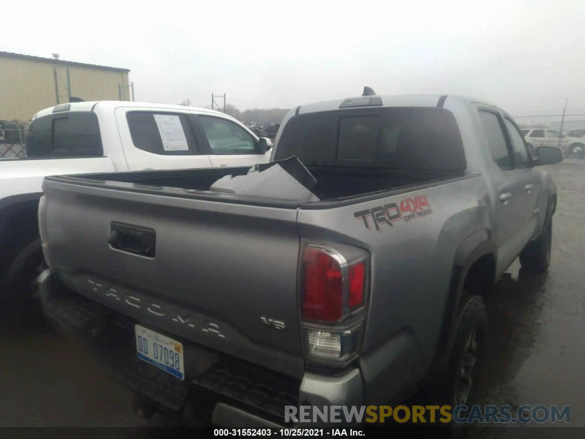 4 Photograph of a damaged car 5TFCZ5AN1MX258938 TOYOTA TACOMA 4WD 2021