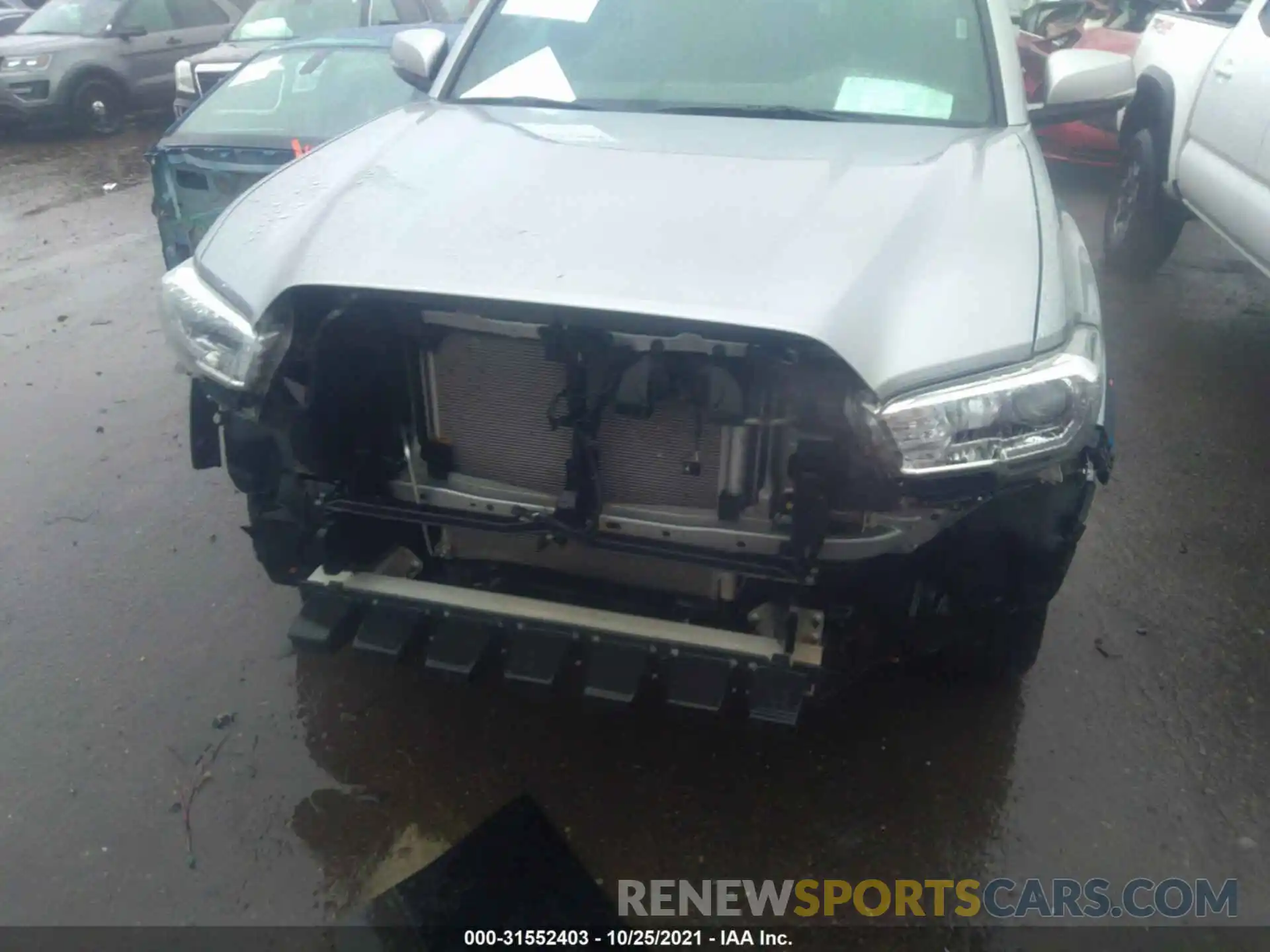 6 Photograph of a damaged car 5TFCZ5AN1MX258938 TOYOTA TACOMA 4WD 2021