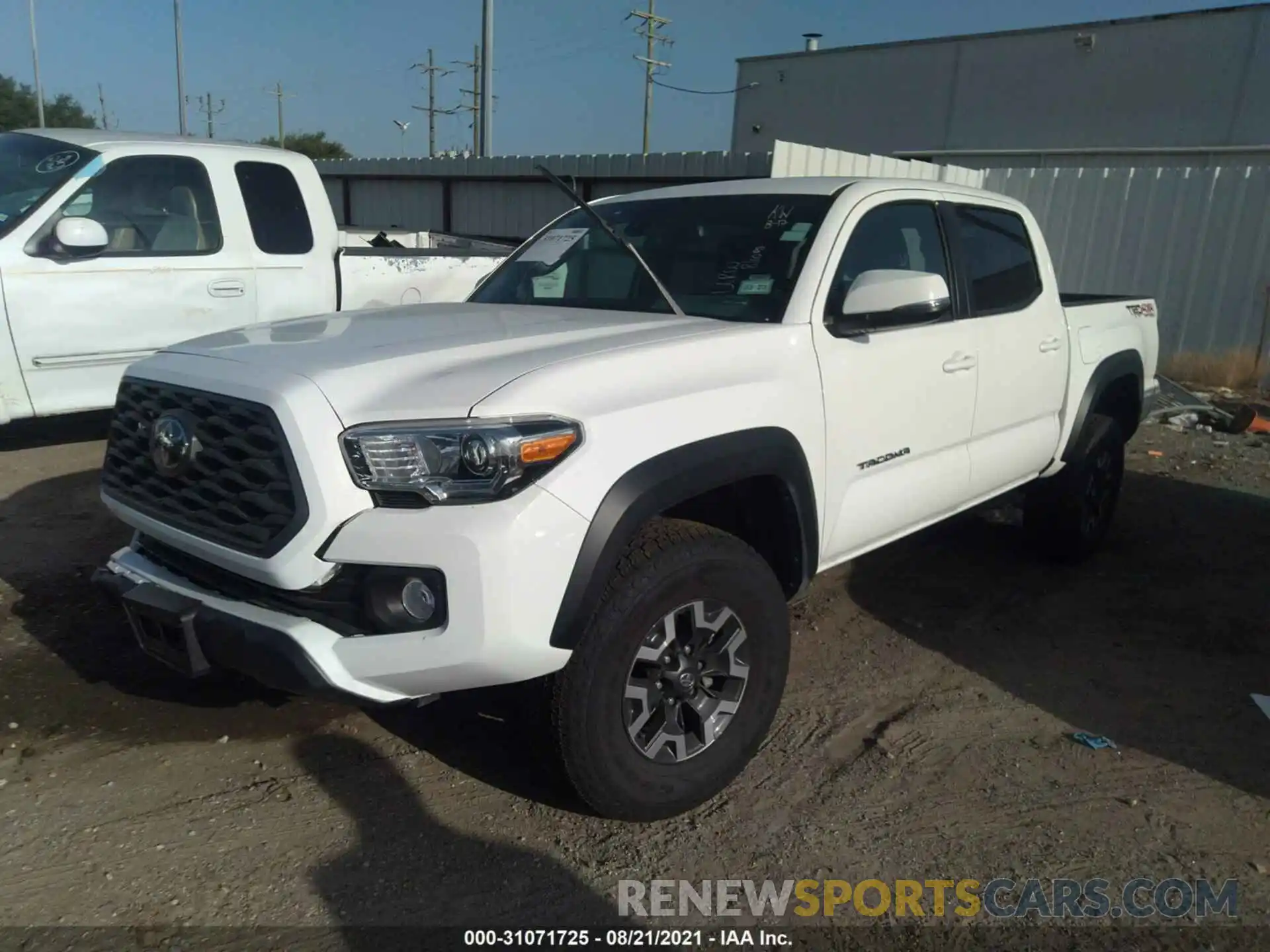 2 Photograph of a damaged car 5TFCZ5AN1MX268773 TOYOTA TACOMA 4WD 2021