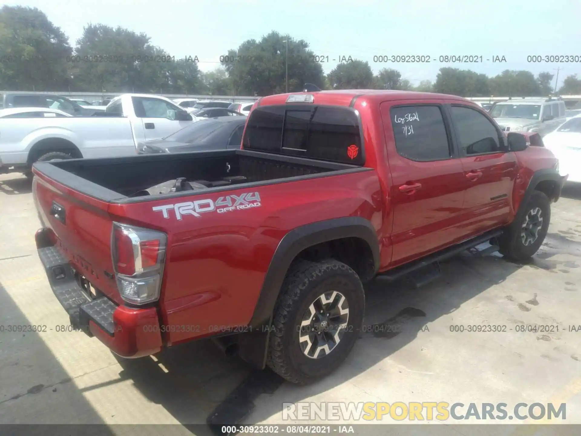 4 Photograph of a damaged car 5TFCZ5AN2MX271438 TOYOTA TACOMA 4WD 2021