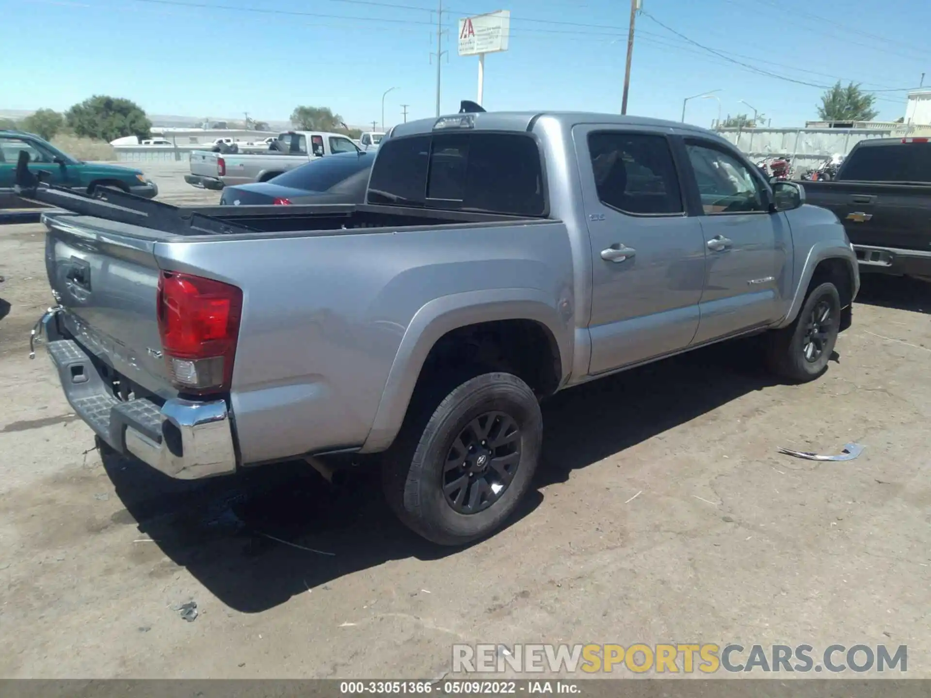 4 Photograph of a damaged car 5TFCZ5AN2MX275862 TOYOTA TACOMA 4WD 2021