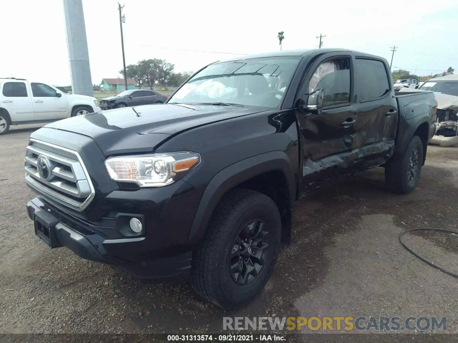 2 Photograph of a damaged car 5TFCZ5AN2MX281399 TOYOTA TACOMA 4WD 2021