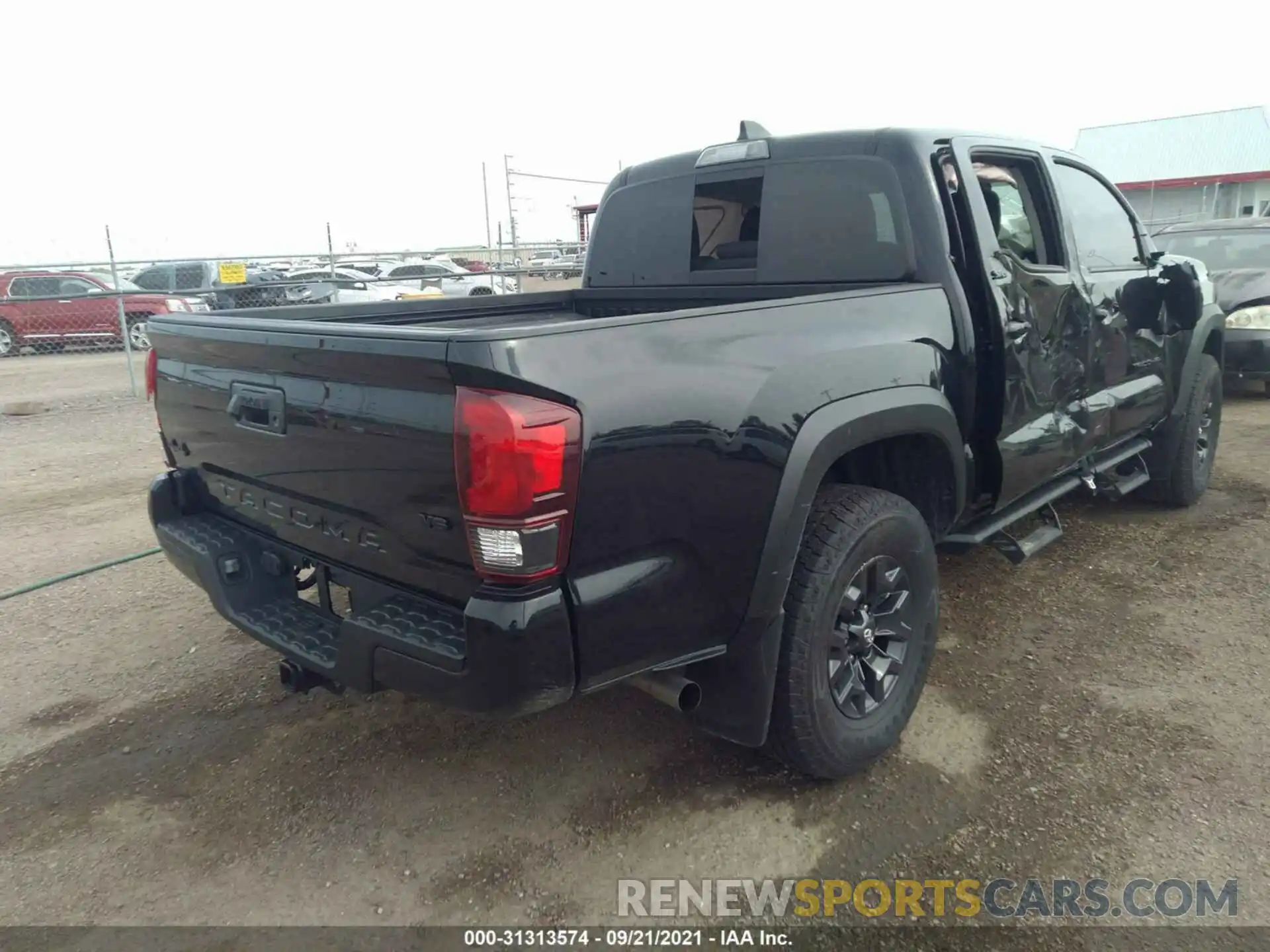 4 Photograph of a damaged car 5TFCZ5AN2MX281399 TOYOTA TACOMA 4WD 2021