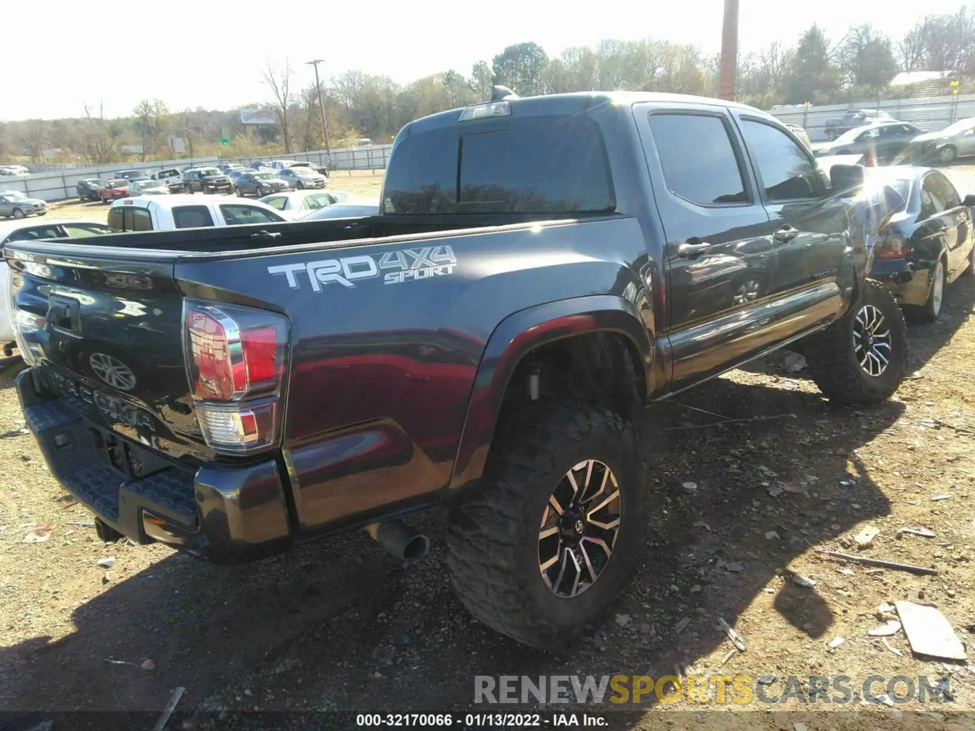 4 Photograph of a damaged car 5TFCZ5AN3MX248072 TOYOTA TACOMA 4WD 2021