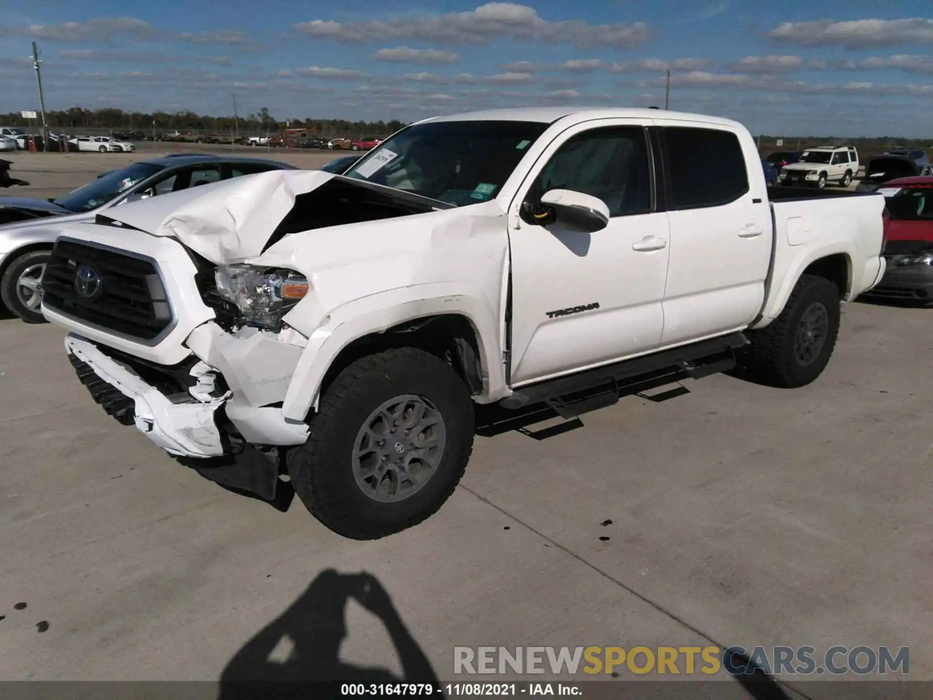 2 Photograph of a damaged car 5TFCZ5AN3MX266491 TOYOTA TACOMA 4WD 2021