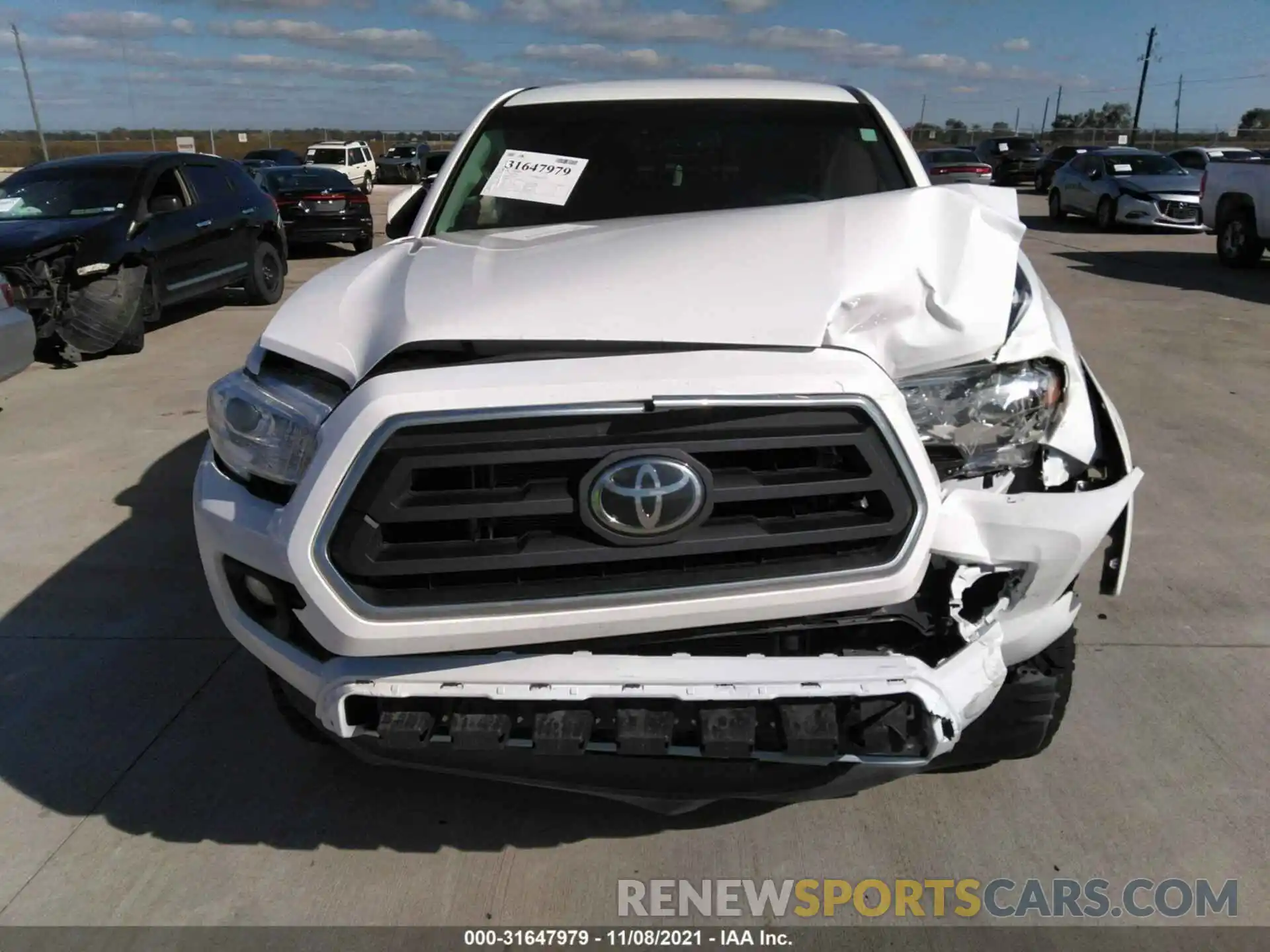 6 Photograph of a damaged car 5TFCZ5AN3MX266491 TOYOTA TACOMA 4WD 2021