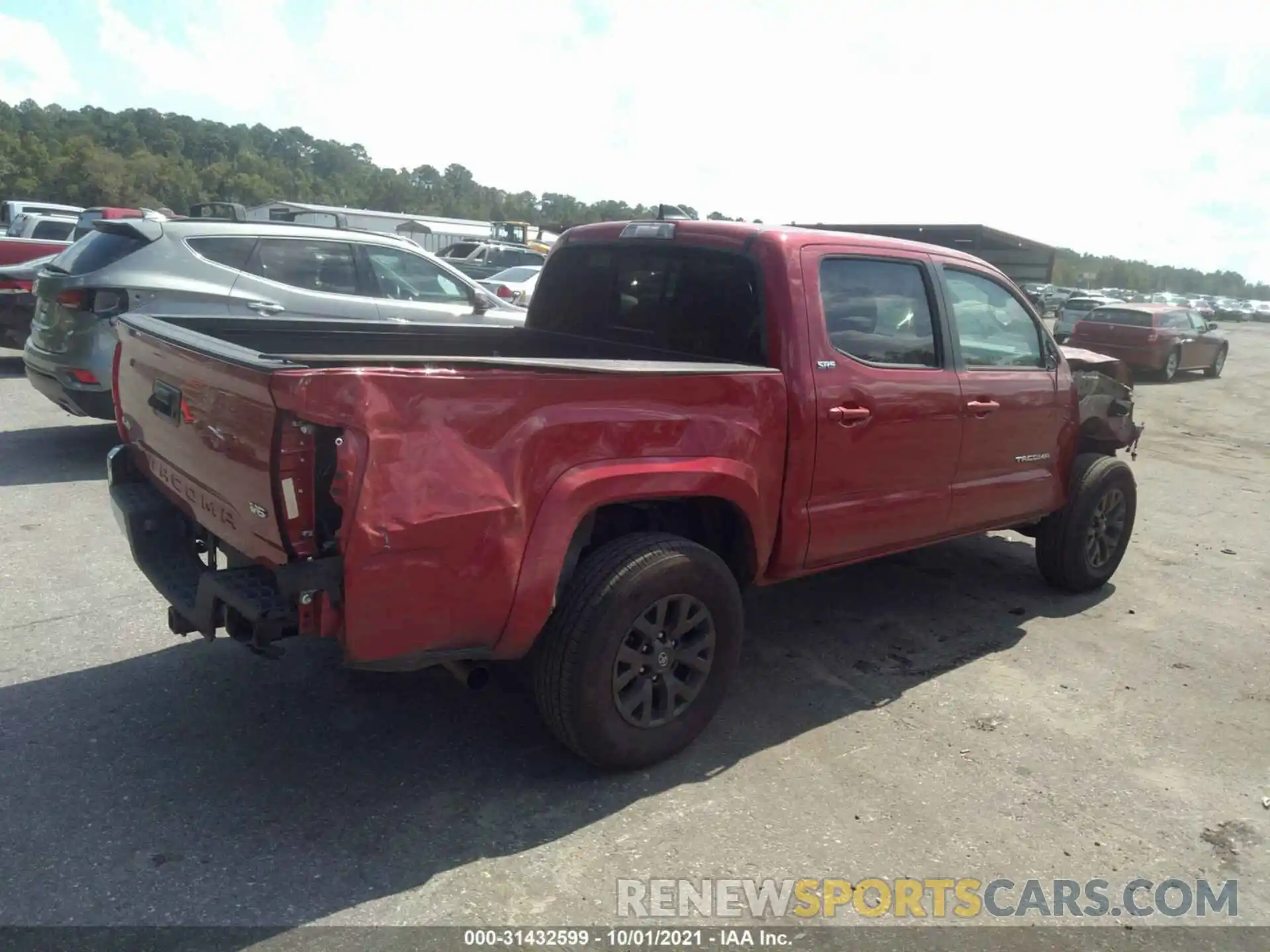 4 Photograph of a damaged car 5TFCZ5AN3MX266927 TOYOTA TACOMA 4WD 2021