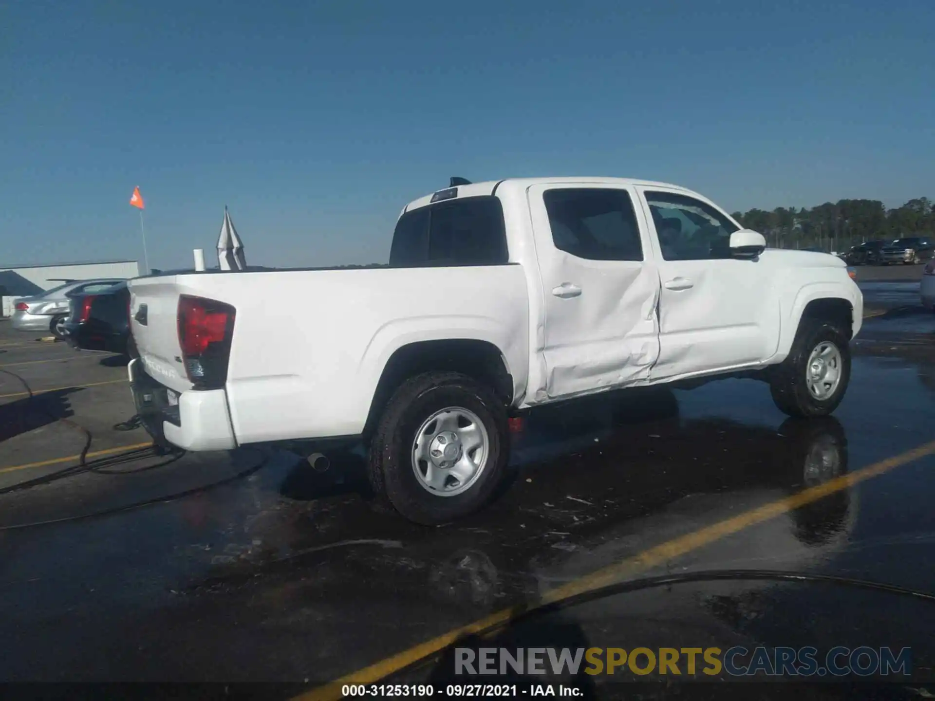 4 Photograph of a damaged car 5TFCZ5AN3MX274686 TOYOTA TACOMA 4WD 2021