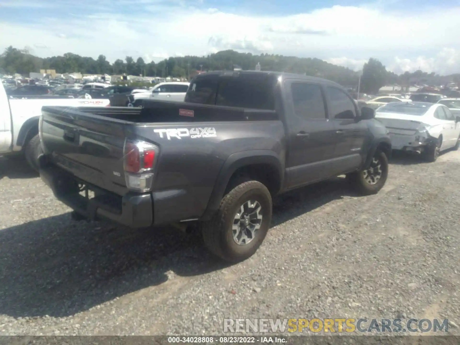 4 Photograph of a damaged car 5TFCZ5AN4MX244516 TOYOTA TACOMA 4WD 2021