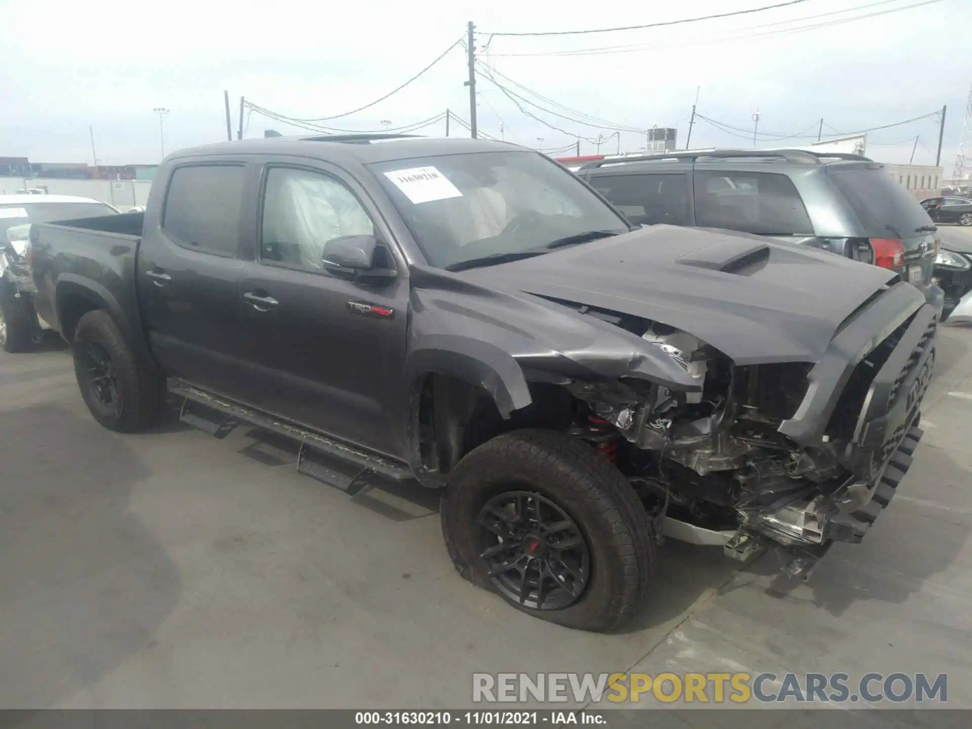 1 Photograph of a damaged car 5TFCZ5AN5MX245075 TOYOTA TACOMA 4WD 2021