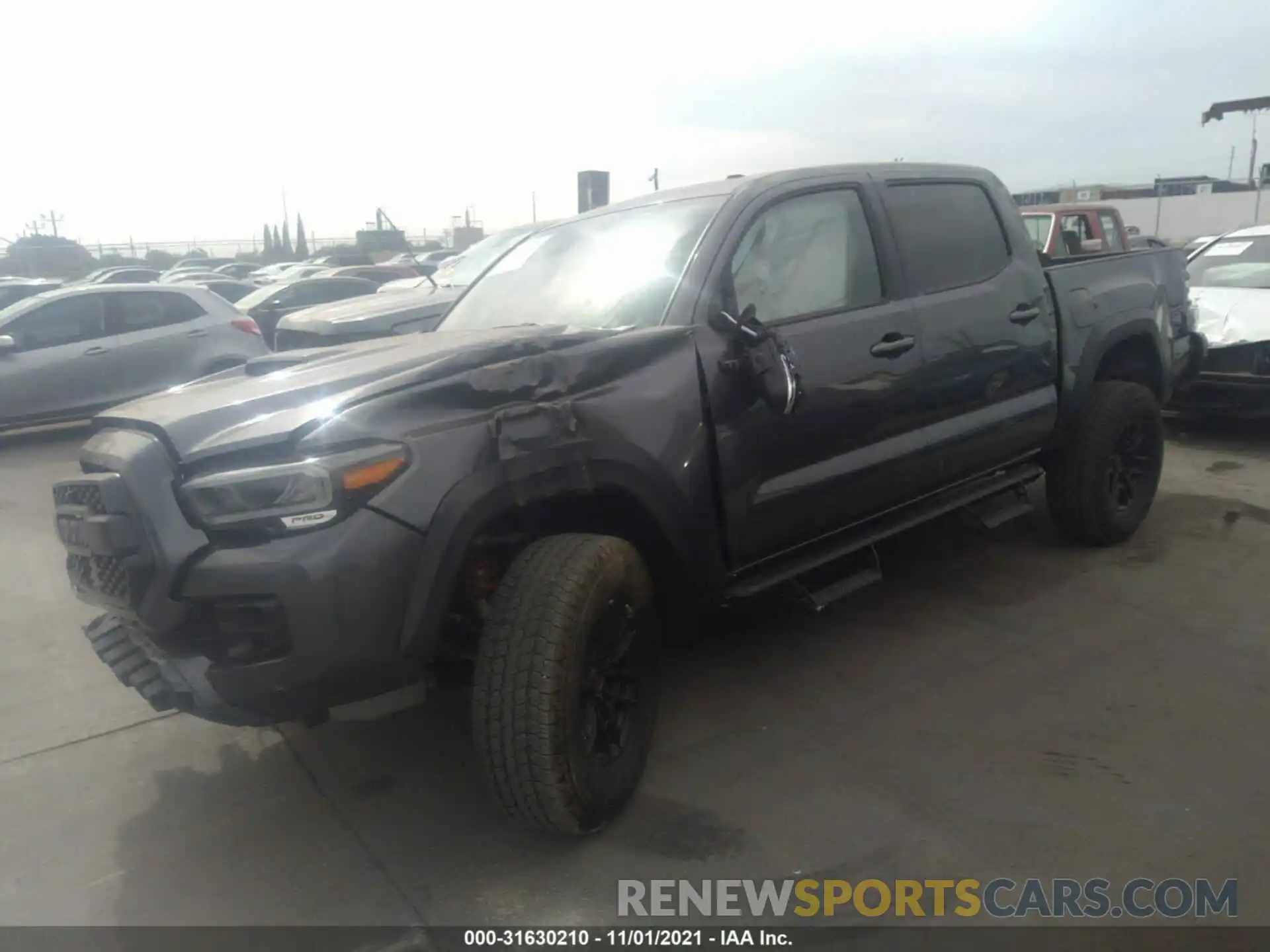 2 Photograph of a damaged car 5TFCZ5AN5MX245075 TOYOTA TACOMA 4WD 2021