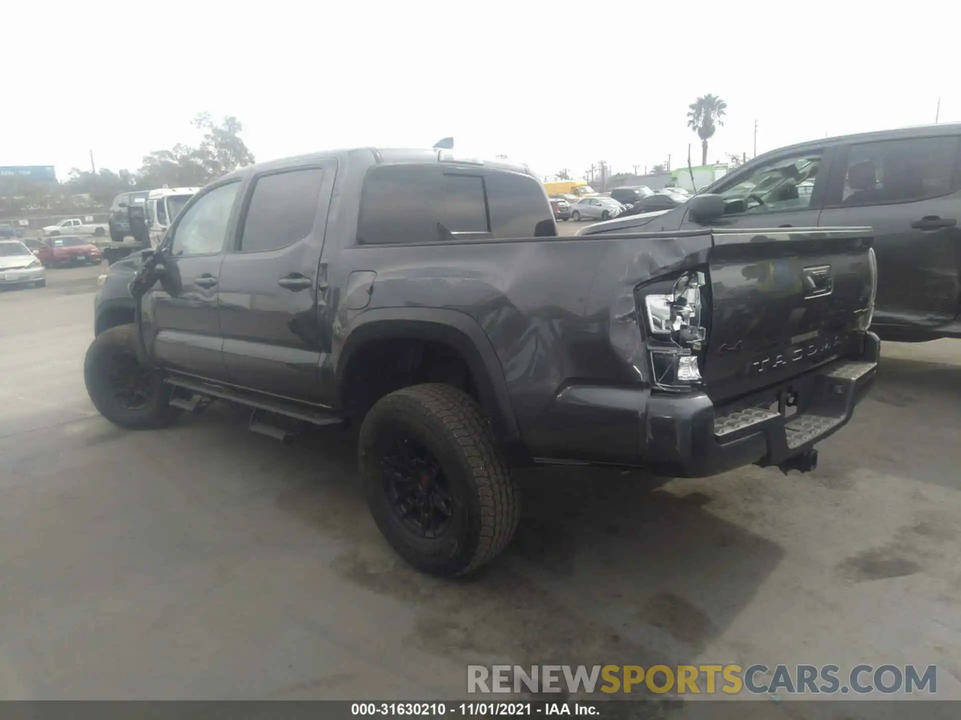 3 Photograph of a damaged car 5TFCZ5AN5MX245075 TOYOTA TACOMA 4WD 2021