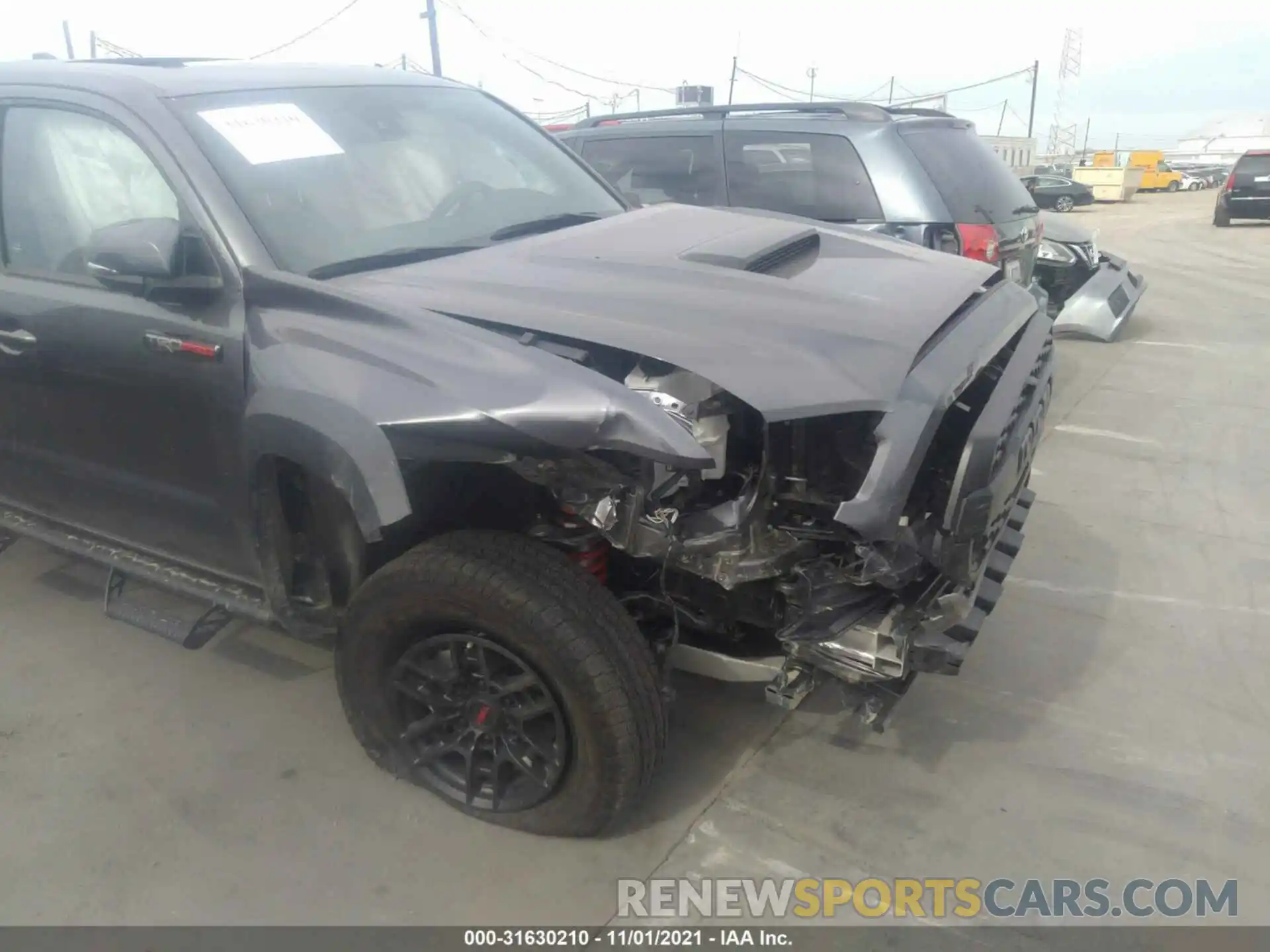 6 Photograph of a damaged car 5TFCZ5AN5MX245075 TOYOTA TACOMA 4WD 2021