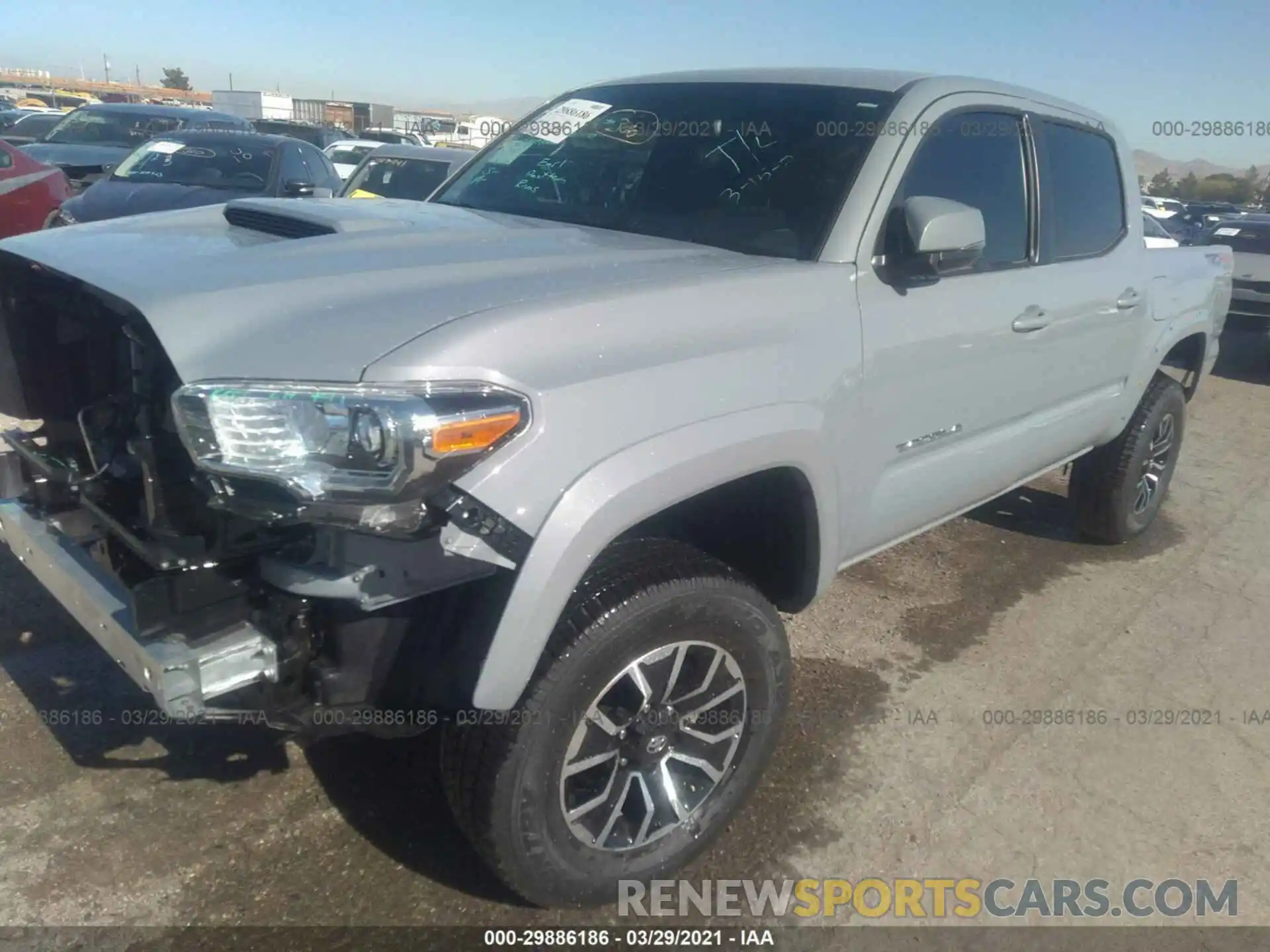 2 Photograph of a damaged car 5TFCZ5AN5MX254147 TOYOTA TACOMA 4WD 2021