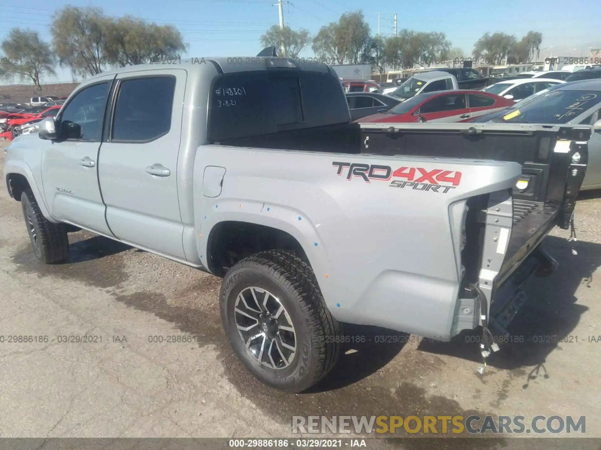 3 Photograph of a damaged car 5TFCZ5AN5MX254147 TOYOTA TACOMA 4WD 2021