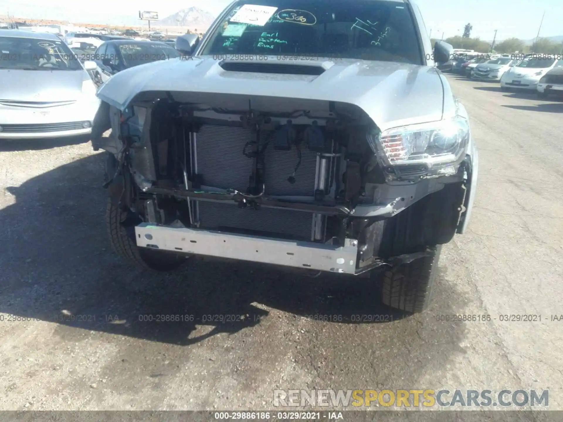 6 Photograph of a damaged car 5TFCZ5AN5MX254147 TOYOTA TACOMA 4WD 2021