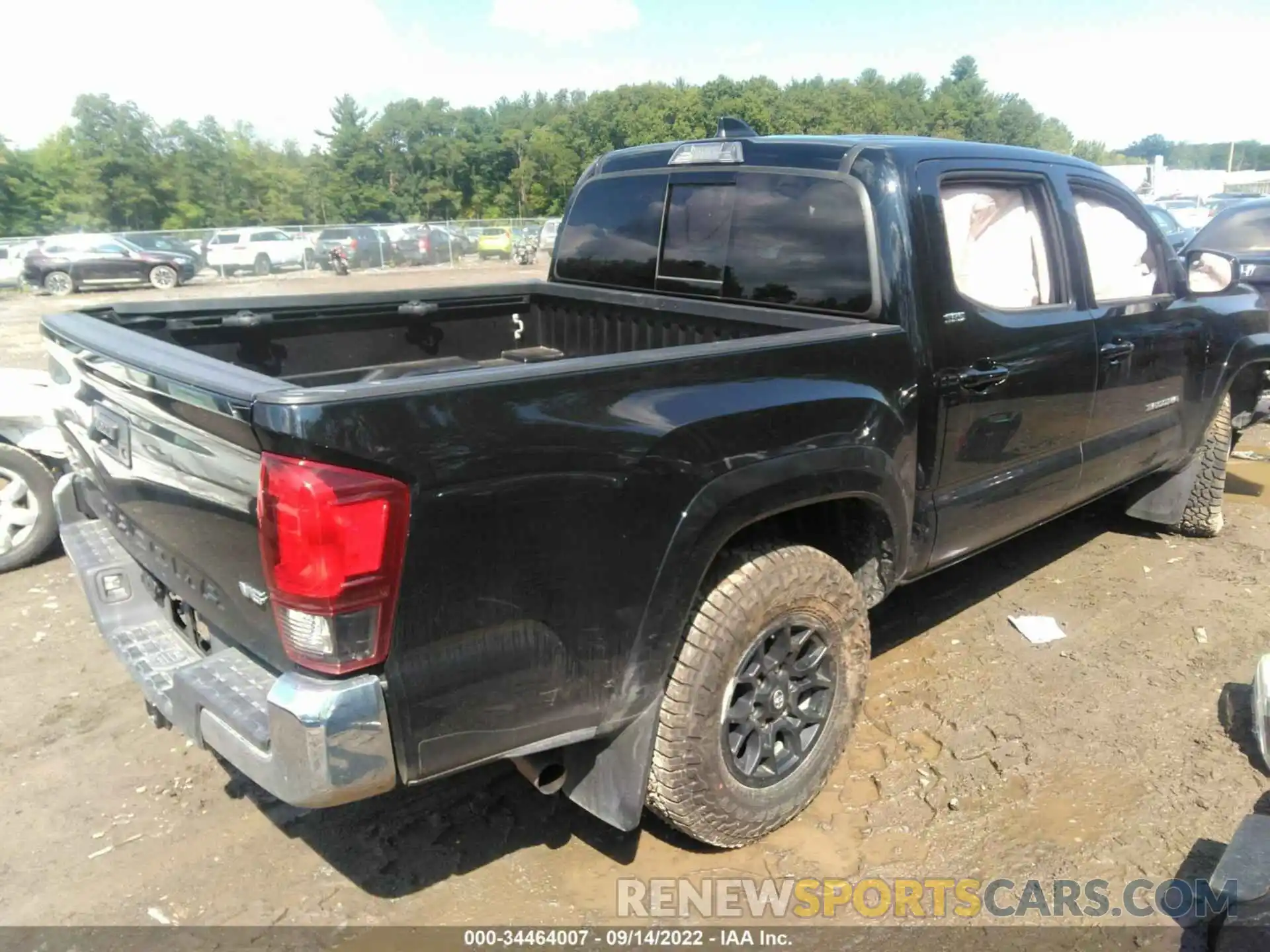 4 Photograph of a damaged car 5TFCZ5AN5MX263611 TOYOTA TACOMA 4WD 2021