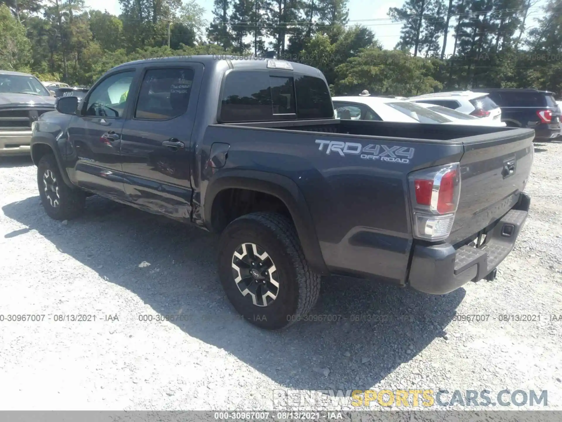 3 Photograph of a damaged car 5TFCZ5AN5MX268274 TOYOTA TACOMA 4WD 2021