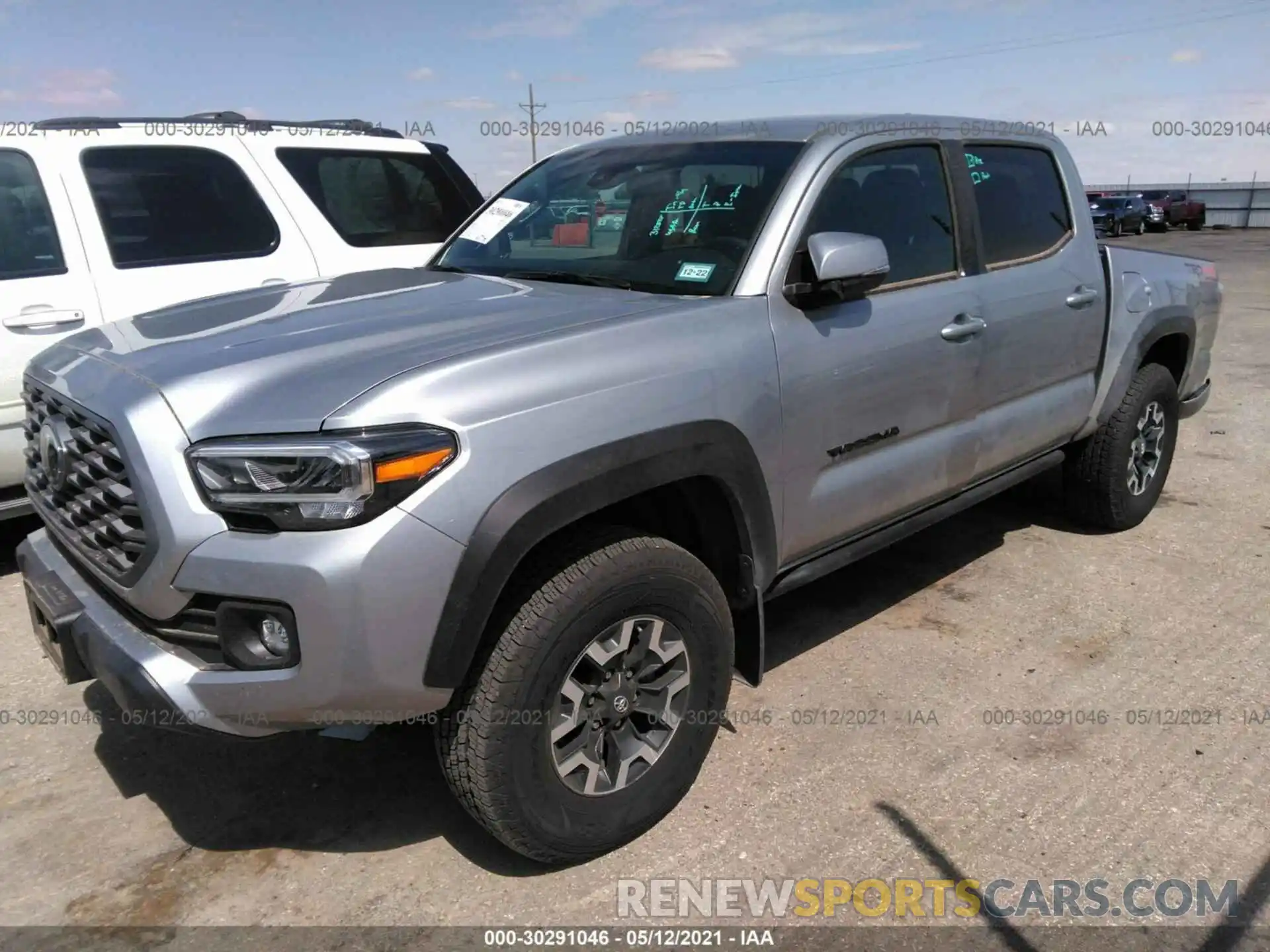 2 Photograph of a damaged car 5TFCZ5AN6MX256649 TOYOTA TACOMA 4WD 2021