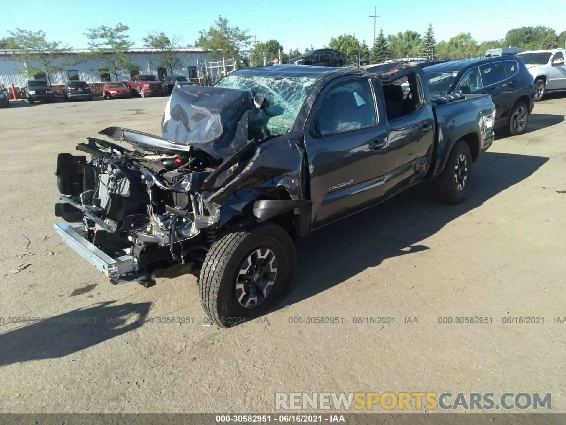 2 Photograph of a damaged car 5TFCZ5AN6MX264637 TOYOTA TACOMA 4WD 2021