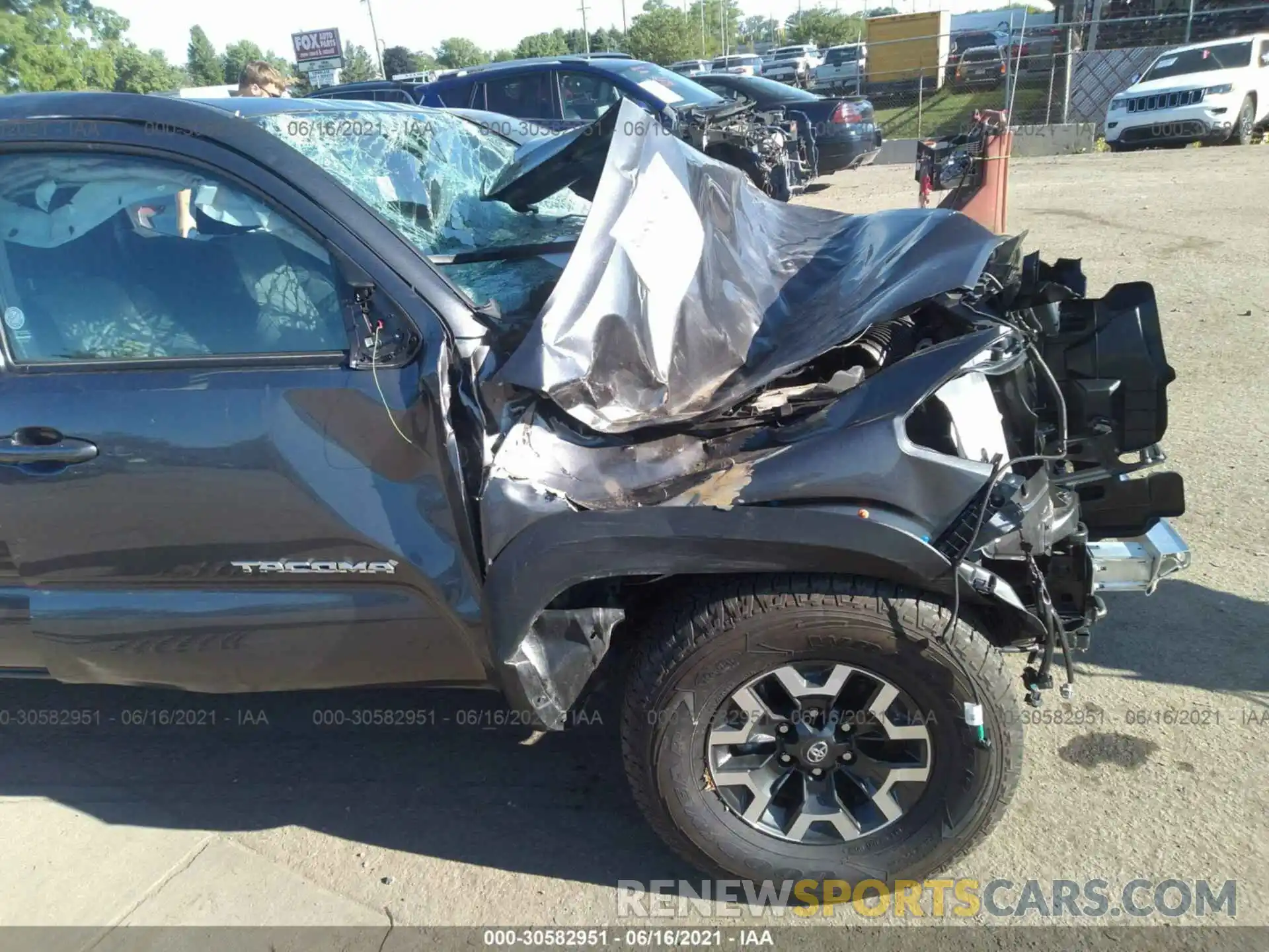 6 Photograph of a damaged car 5TFCZ5AN6MX264637 TOYOTA TACOMA 4WD 2021