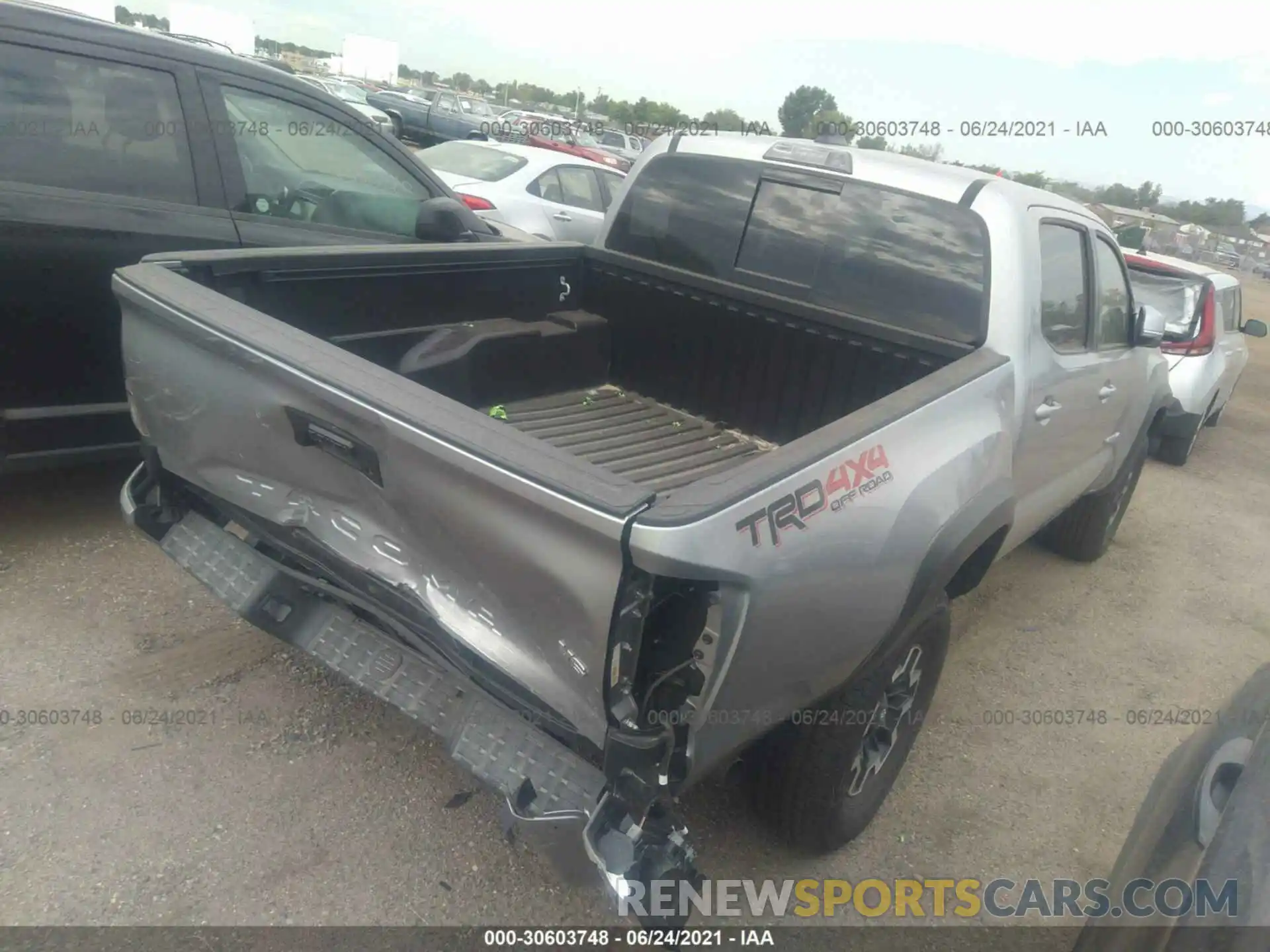 4 Photograph of a damaged car 5TFCZ5AN6MX265643 TOYOTA TACOMA 4WD 2021