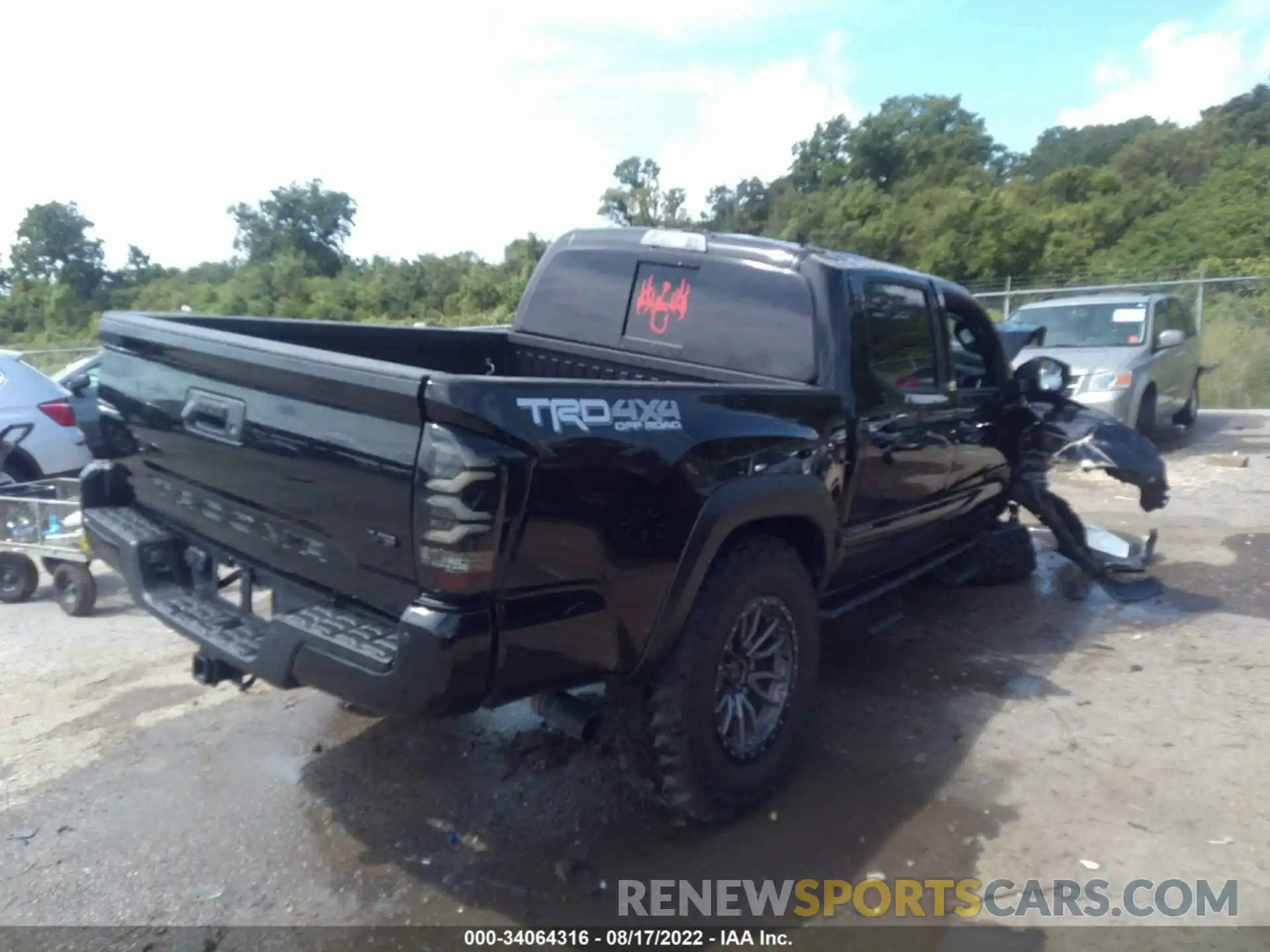 4 Photograph of a damaged car 5TFCZ5AN6MX274830 TOYOTA TACOMA 4WD 2021