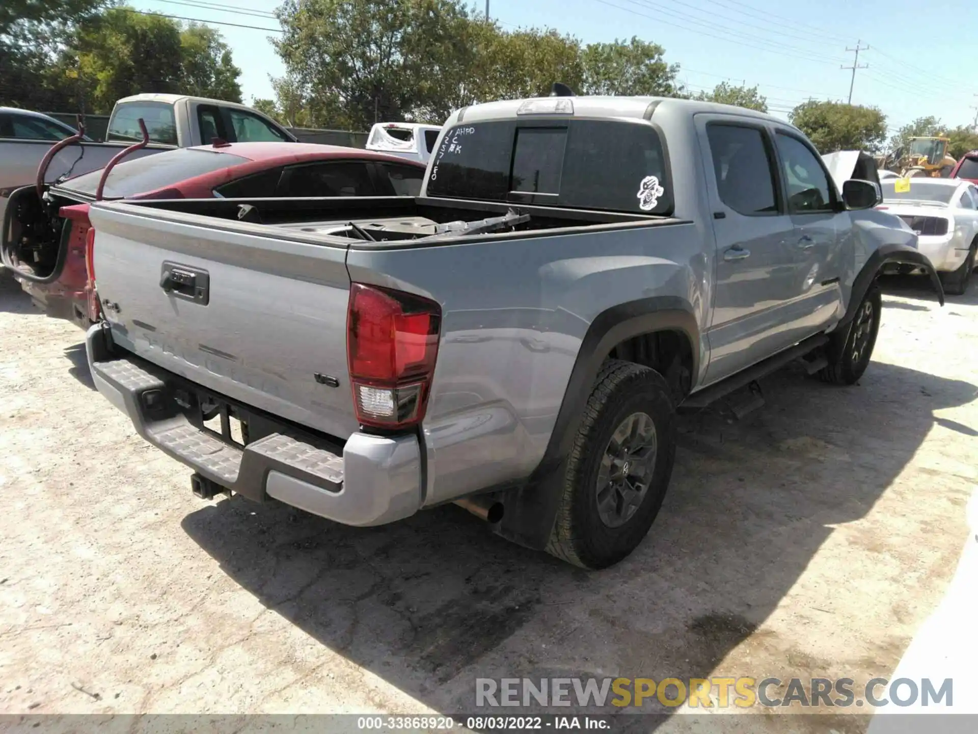 4 Photograph of a damaged car 5TFCZ5AN6MX279977 TOYOTA TACOMA 4WD 2021