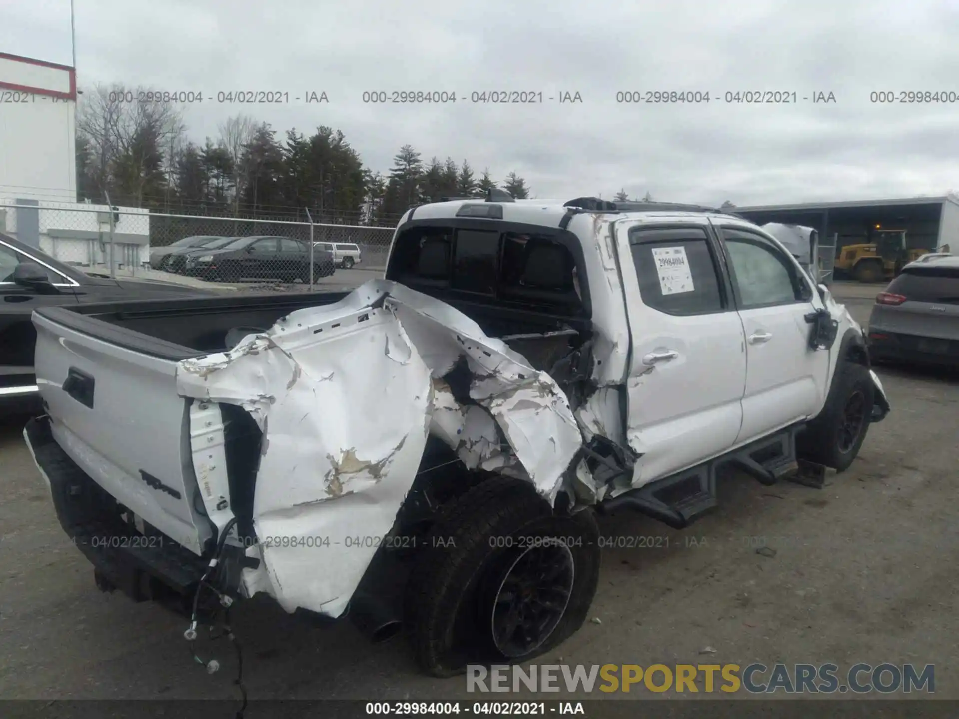 4 Photograph of a damaged car 5TFCZ5AN7MX247510 TOYOTA TACOMA 4WD 2021