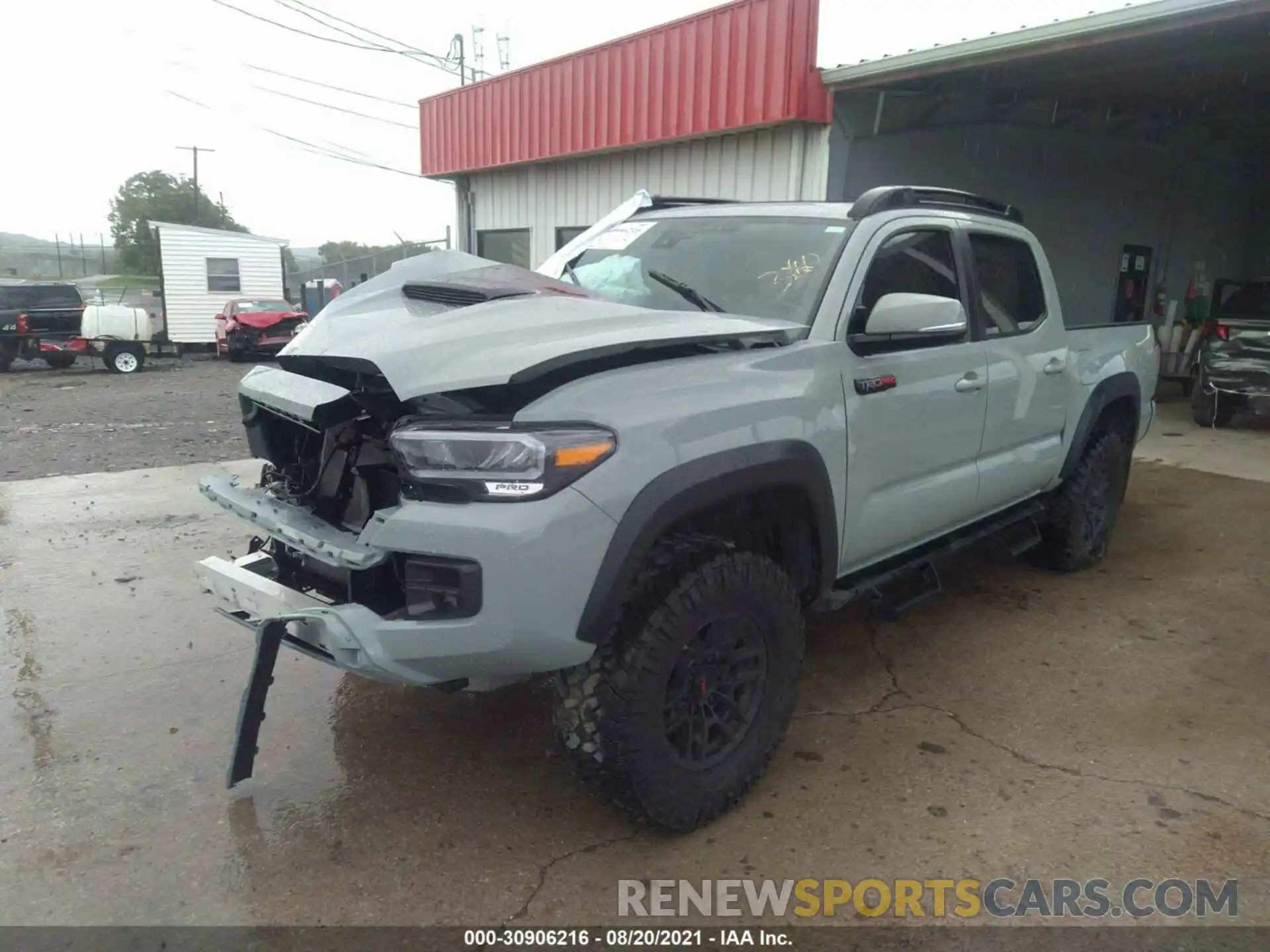 2 Photograph of a damaged car 5TFCZ5AN7MX254697 TOYOTA TACOMA 4WD 2021