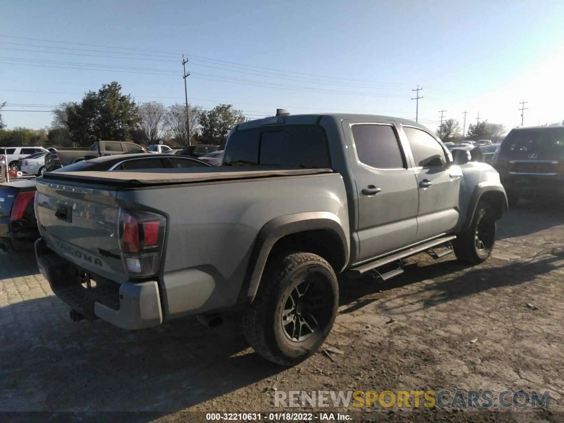 4 Photograph of a damaged car 5TFCZ5AN7MX268065 TOYOTA TACOMA 4WD 2021