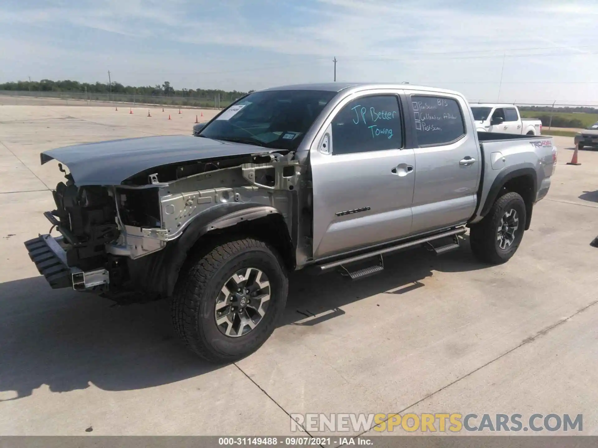 2 Photograph of a damaged car 5TFCZ5AN7MX273041 TOYOTA TACOMA 4WD 2021