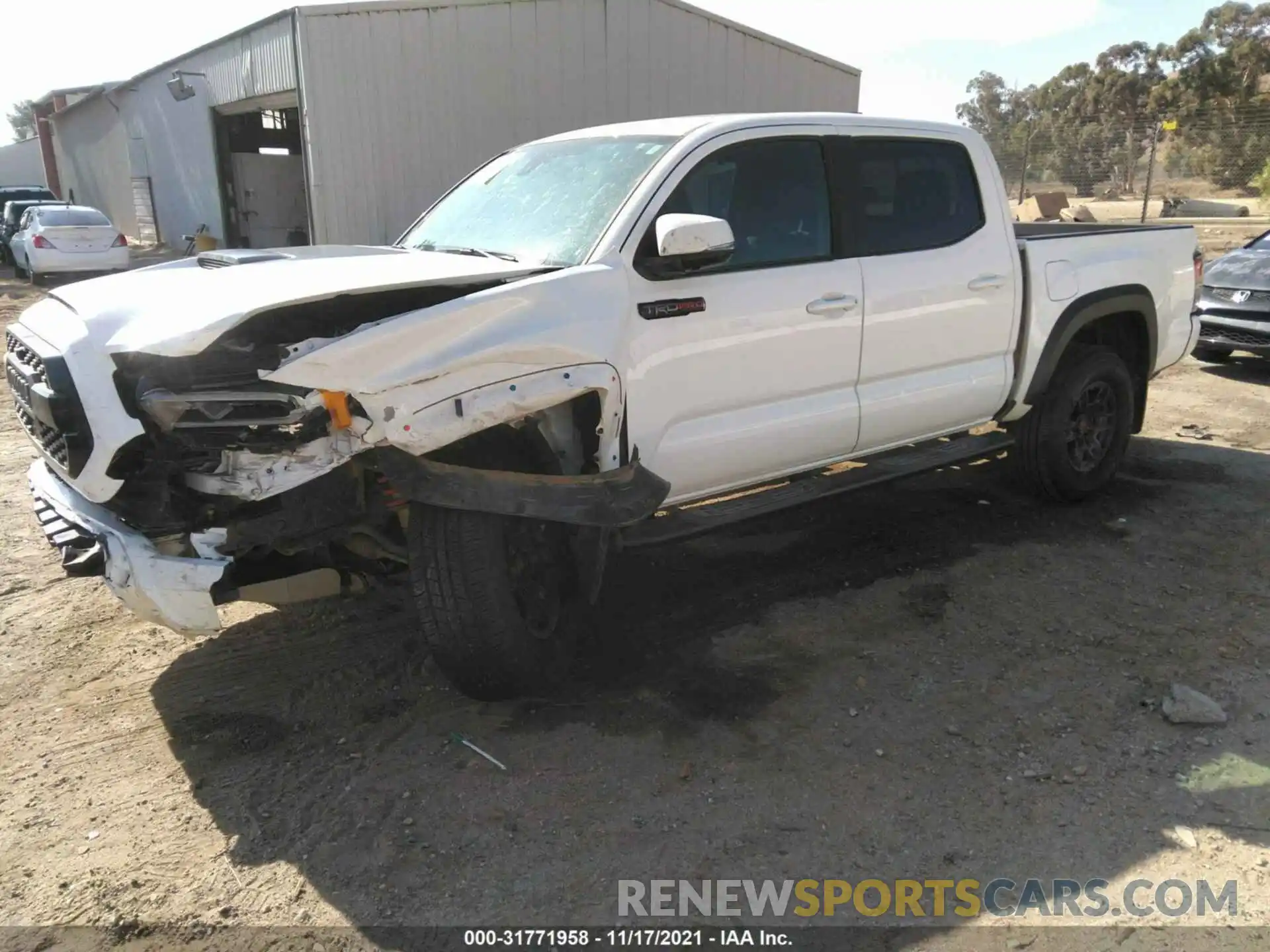 2 Photograph of a damaged car 5TFCZ5AN8MX249184 TOYOTA TACOMA 4WD 2021