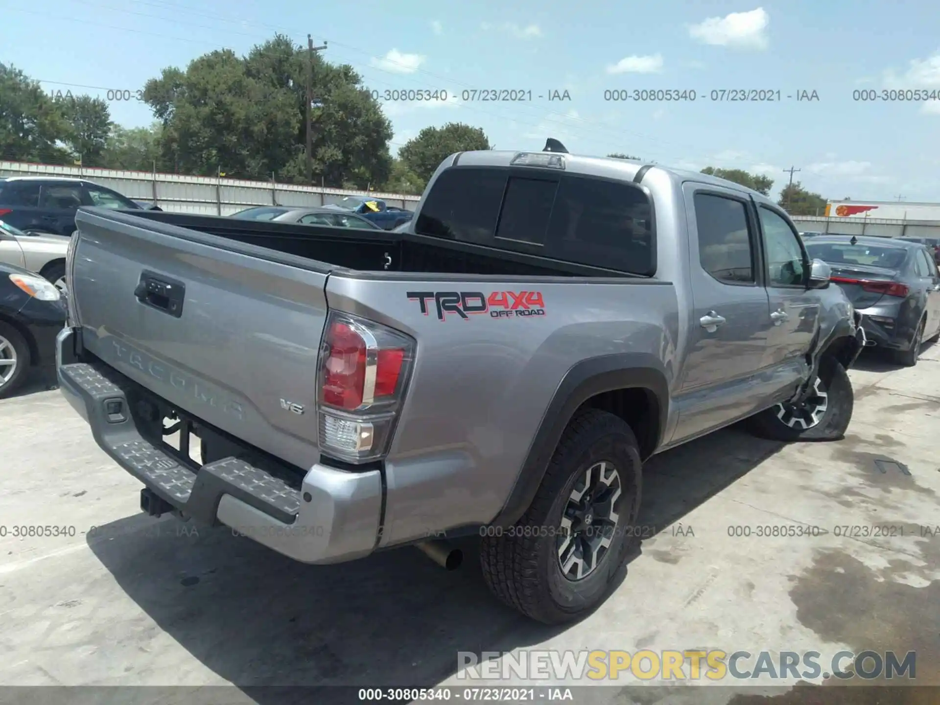 4 Photograph of a damaged car 5TFCZ5AN8MX269080 TOYOTA TACOMA 4WD 2021