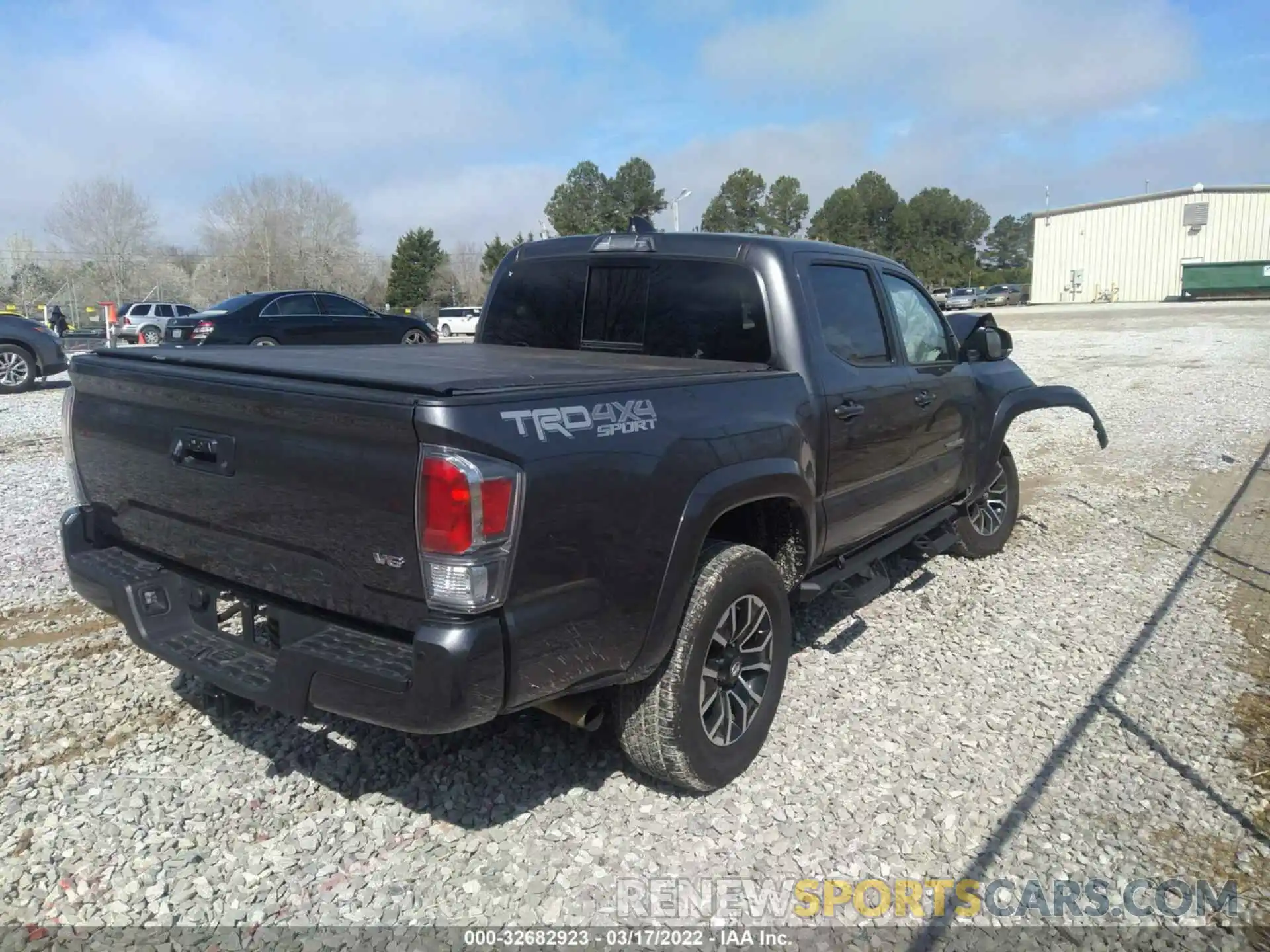 4 Photograph of a damaged car 5TFCZ5AN9MX245970 TOYOTA TACOMA 4WD 2021