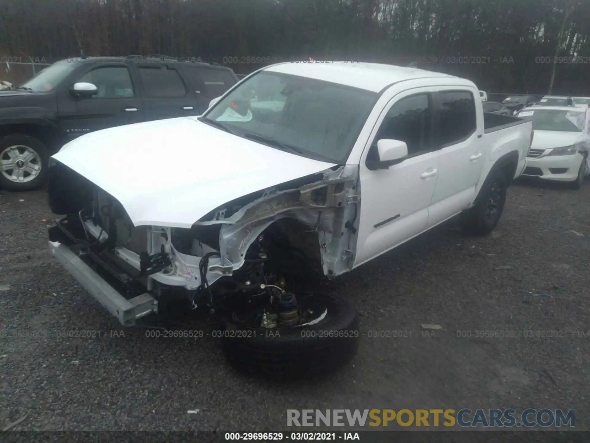 2 Photograph of a damaged car 5TFCZ5AN9MX246780 TOYOTA TACOMA 4WD 2021