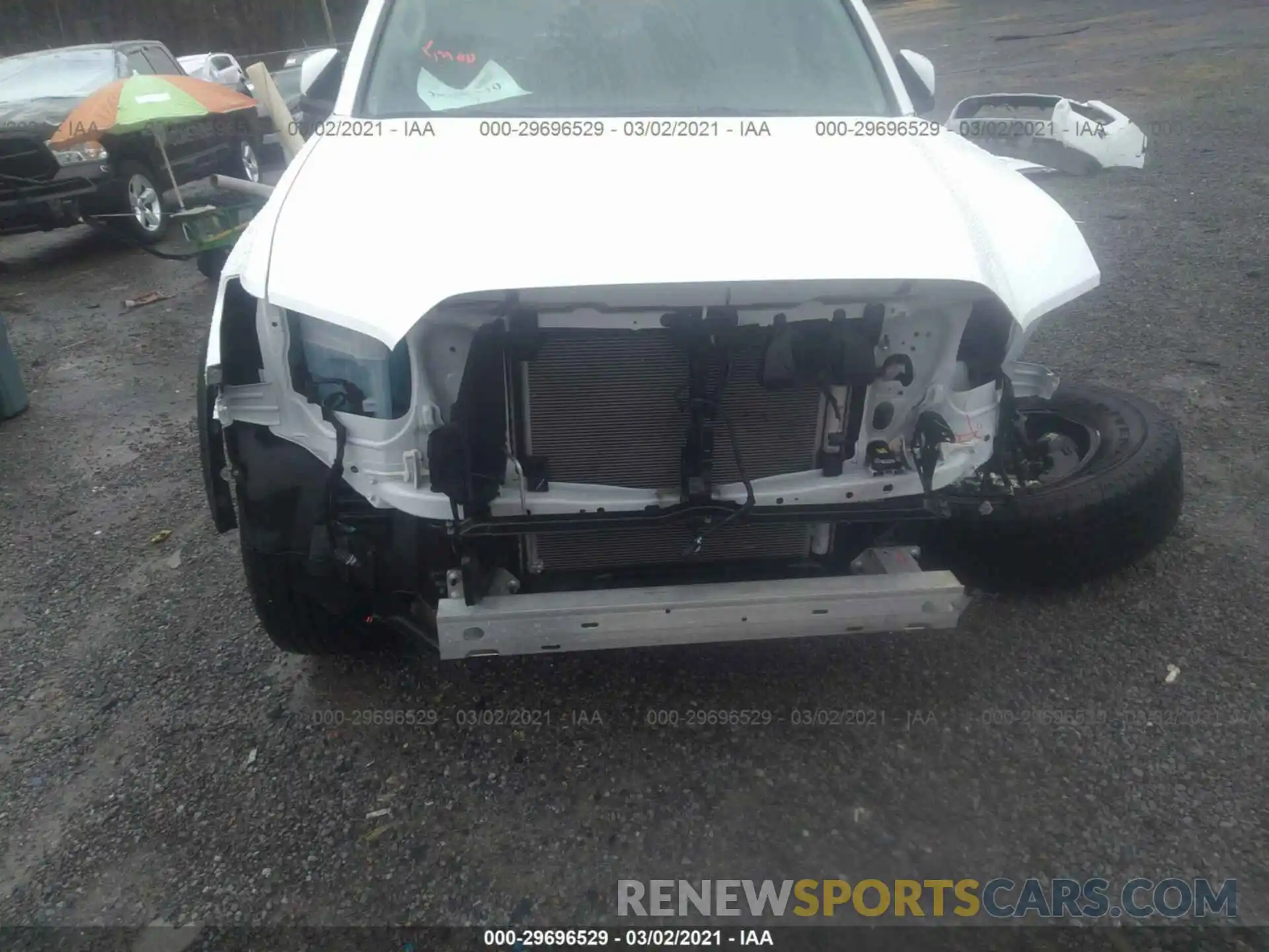 6 Photograph of a damaged car 5TFCZ5AN9MX246780 TOYOTA TACOMA 4WD 2021