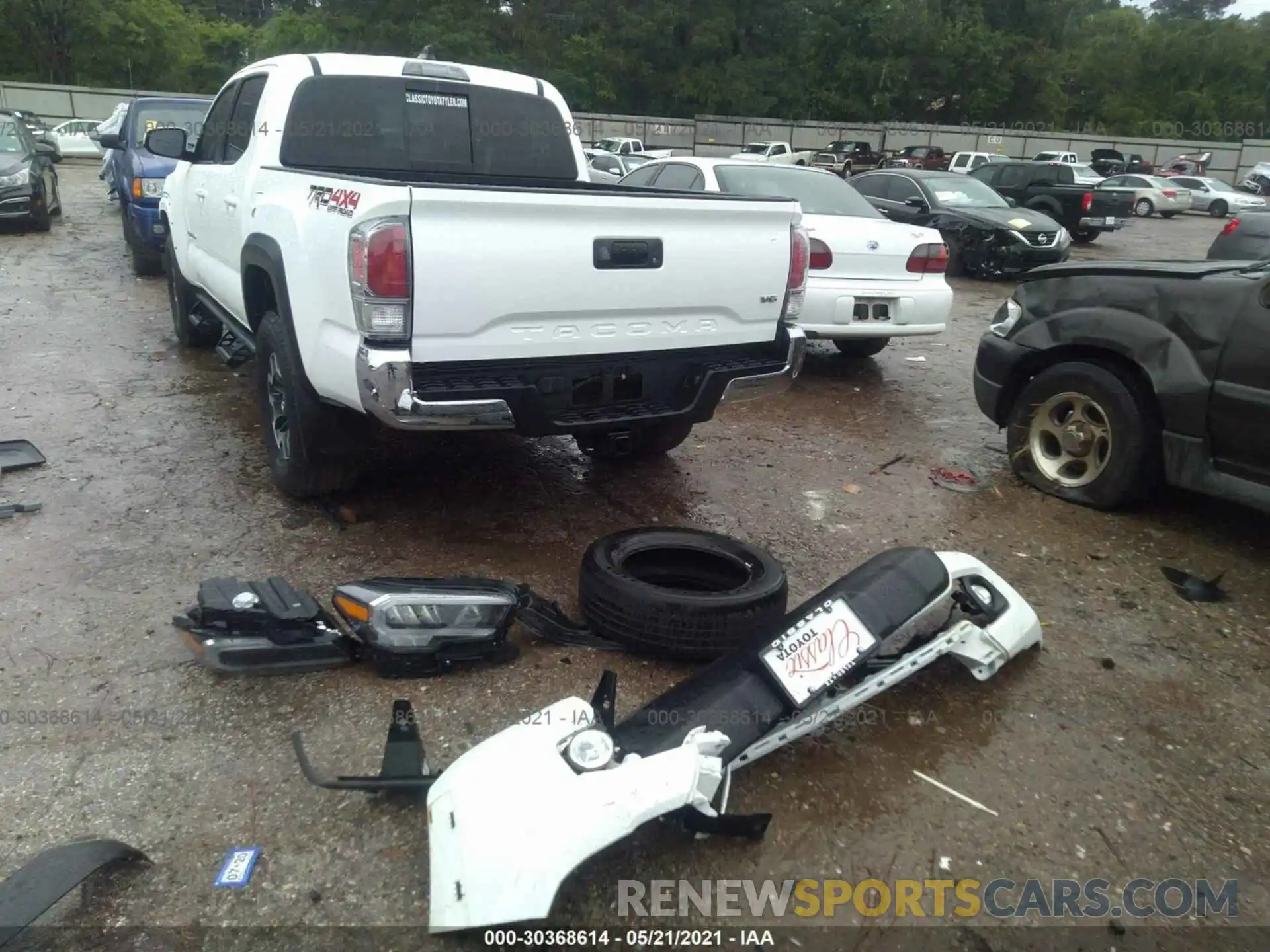 12 Photograph of a damaged car 5TFCZ5AN9MX246858 TOYOTA TACOMA 4WD 2021