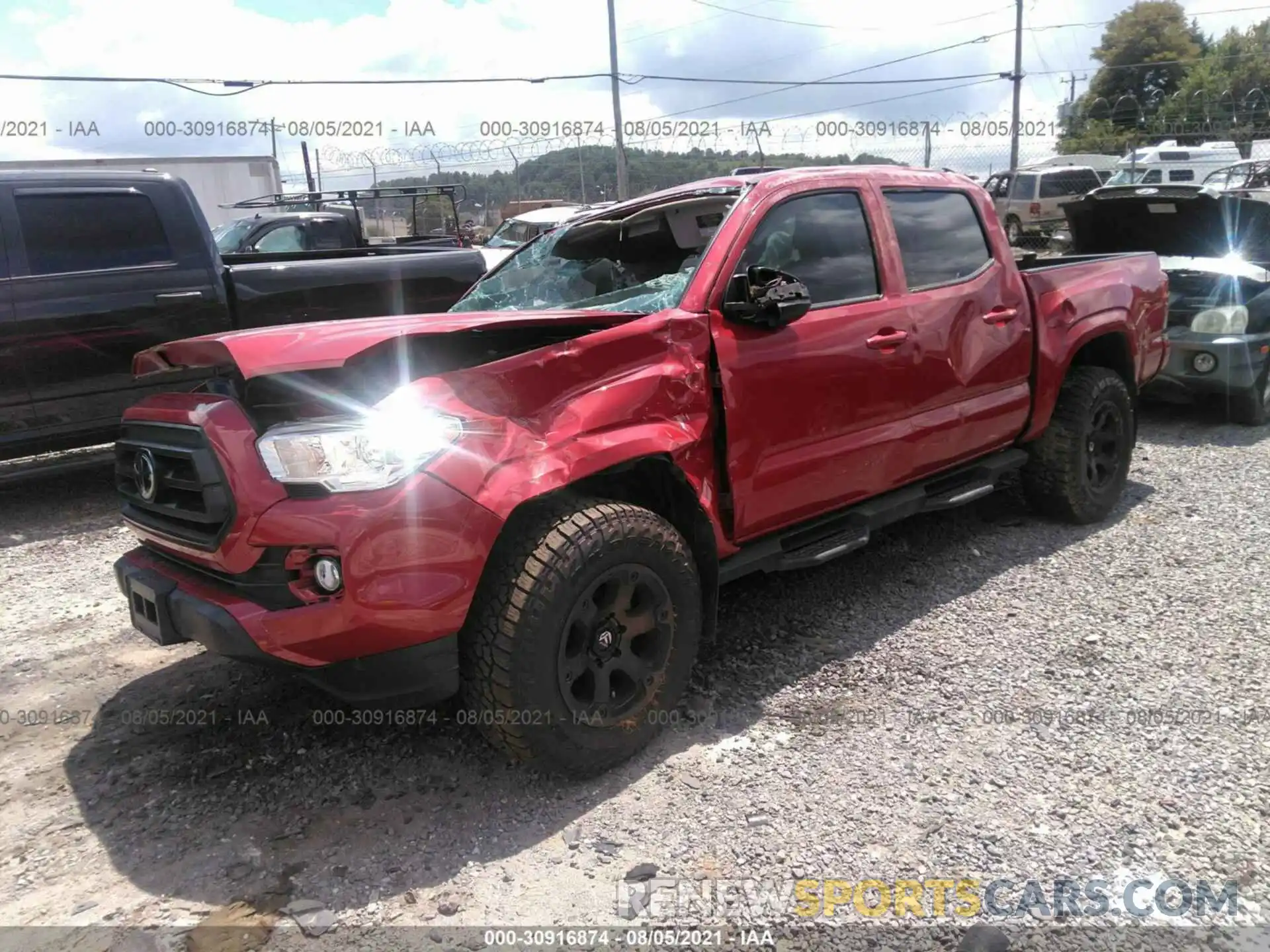 2 Photograph of a damaged car 5TFCZ5AN9MX254149 TOYOTA TACOMA 4WD 2021