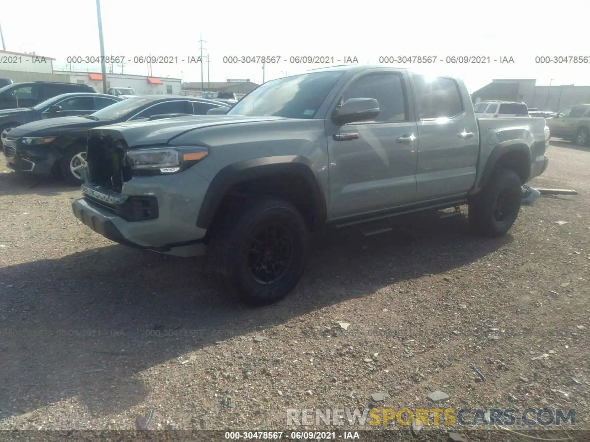 2 Photograph of a damaged car 5TFCZ5AN9MX254703 TOYOTA TACOMA 4WD 2021