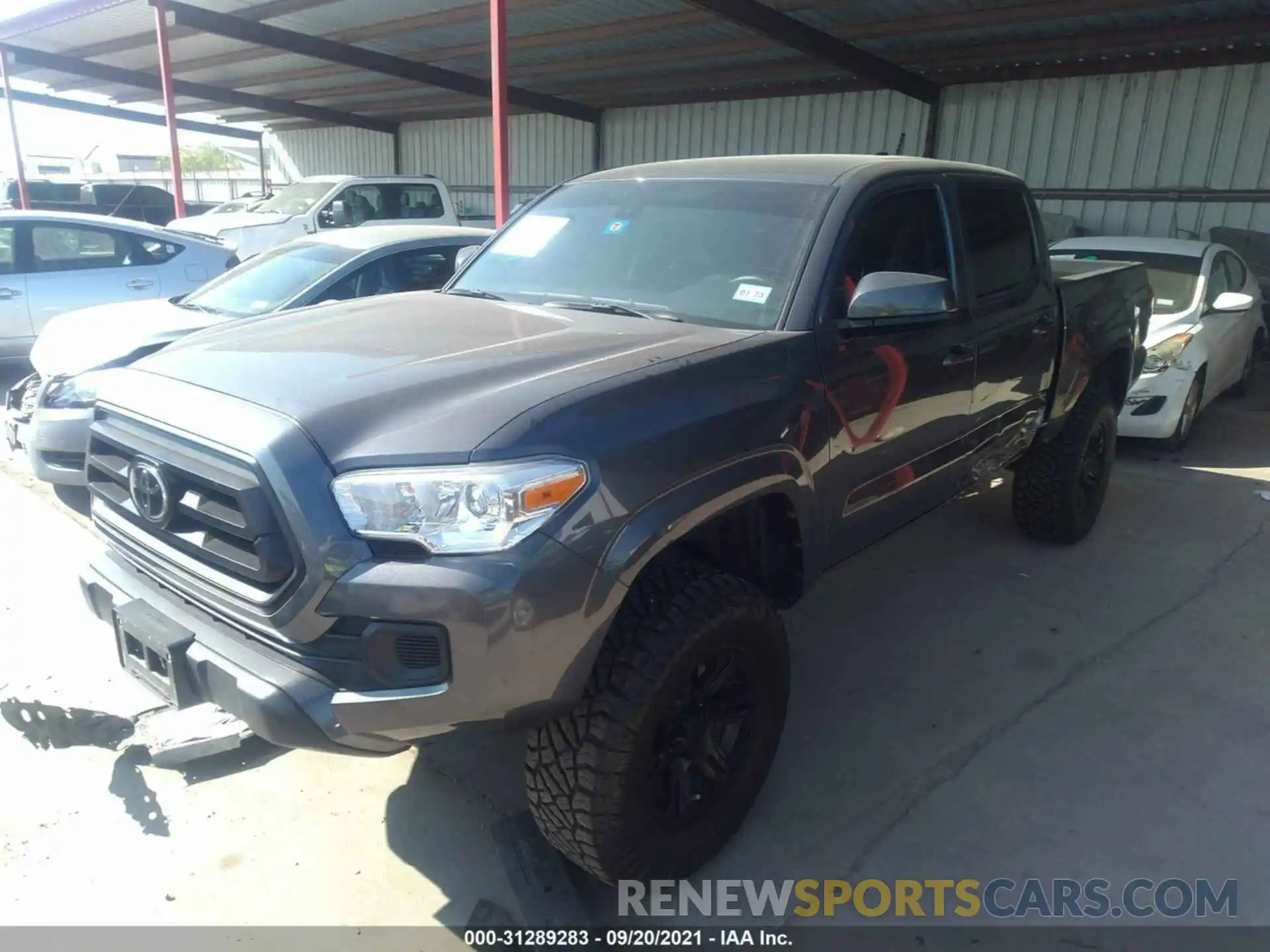 2 Photograph of a damaged car 5TFCZ5AN9MX257780 TOYOTA TACOMA 4WD 2021