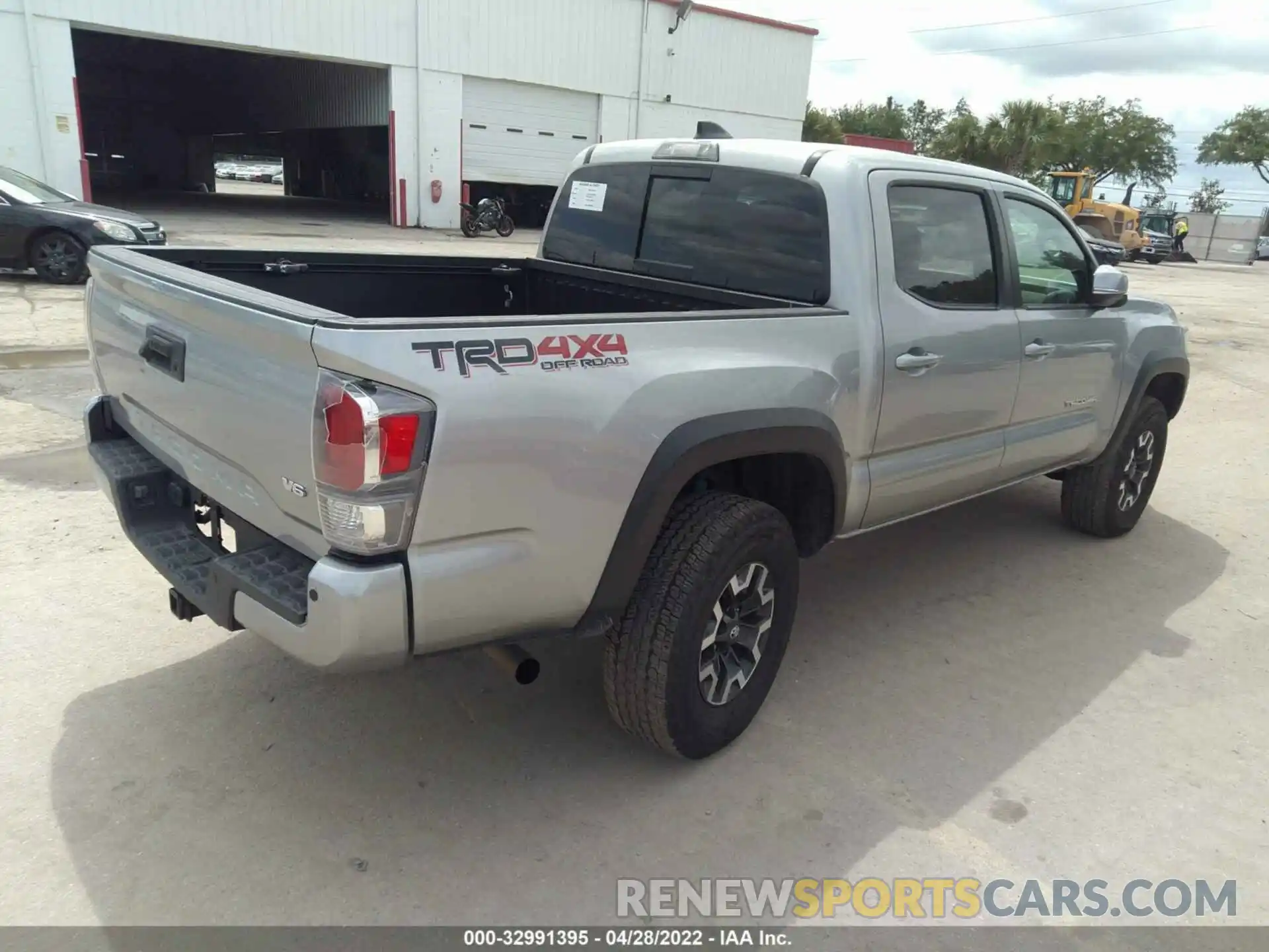 4 Photograph of a damaged car 5TFCZ5AN9MX263689 TOYOTA TACOMA 4WD 2021