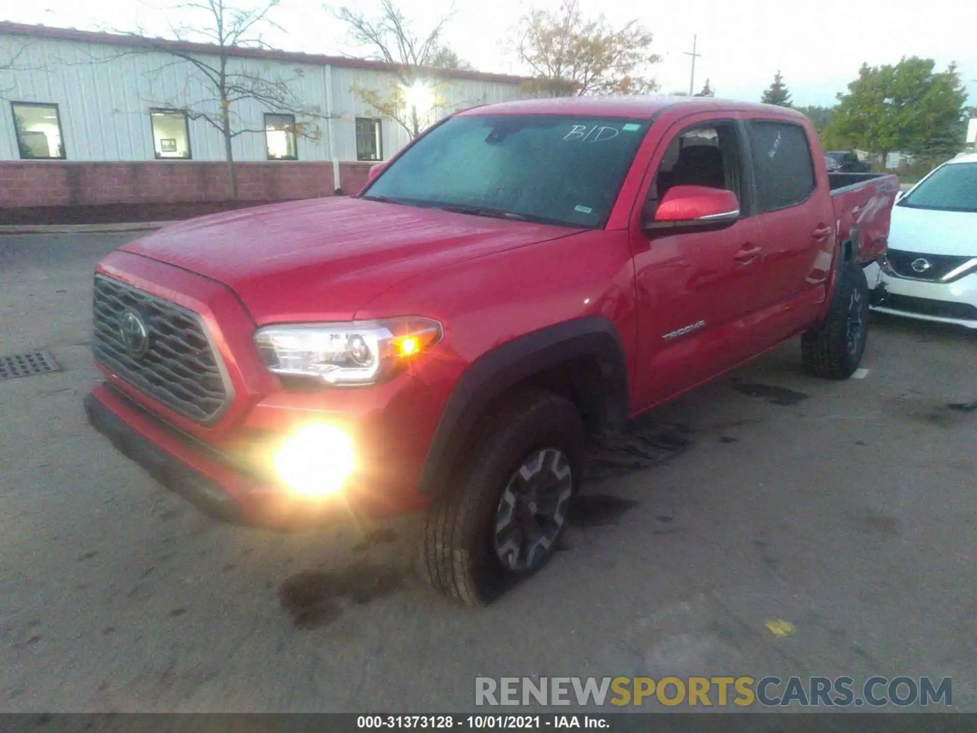 2 Photograph of a damaged car 5TFCZ5AN9MX265152 TOYOTA TACOMA 4WD 2021