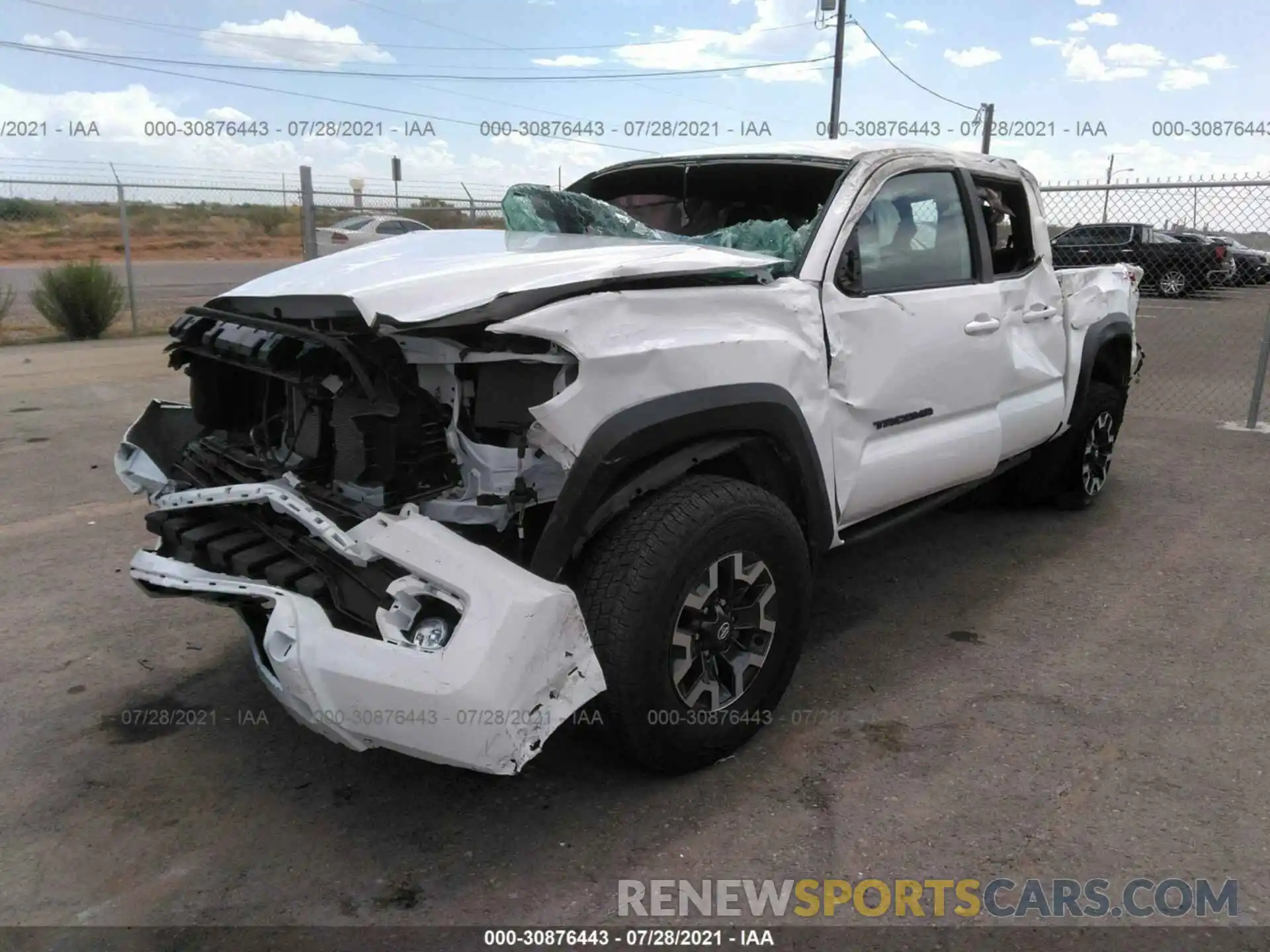 2 Photograph of a damaged car 5TFCZ5AN9MX267354 TOYOTA TACOMA 4WD 2021