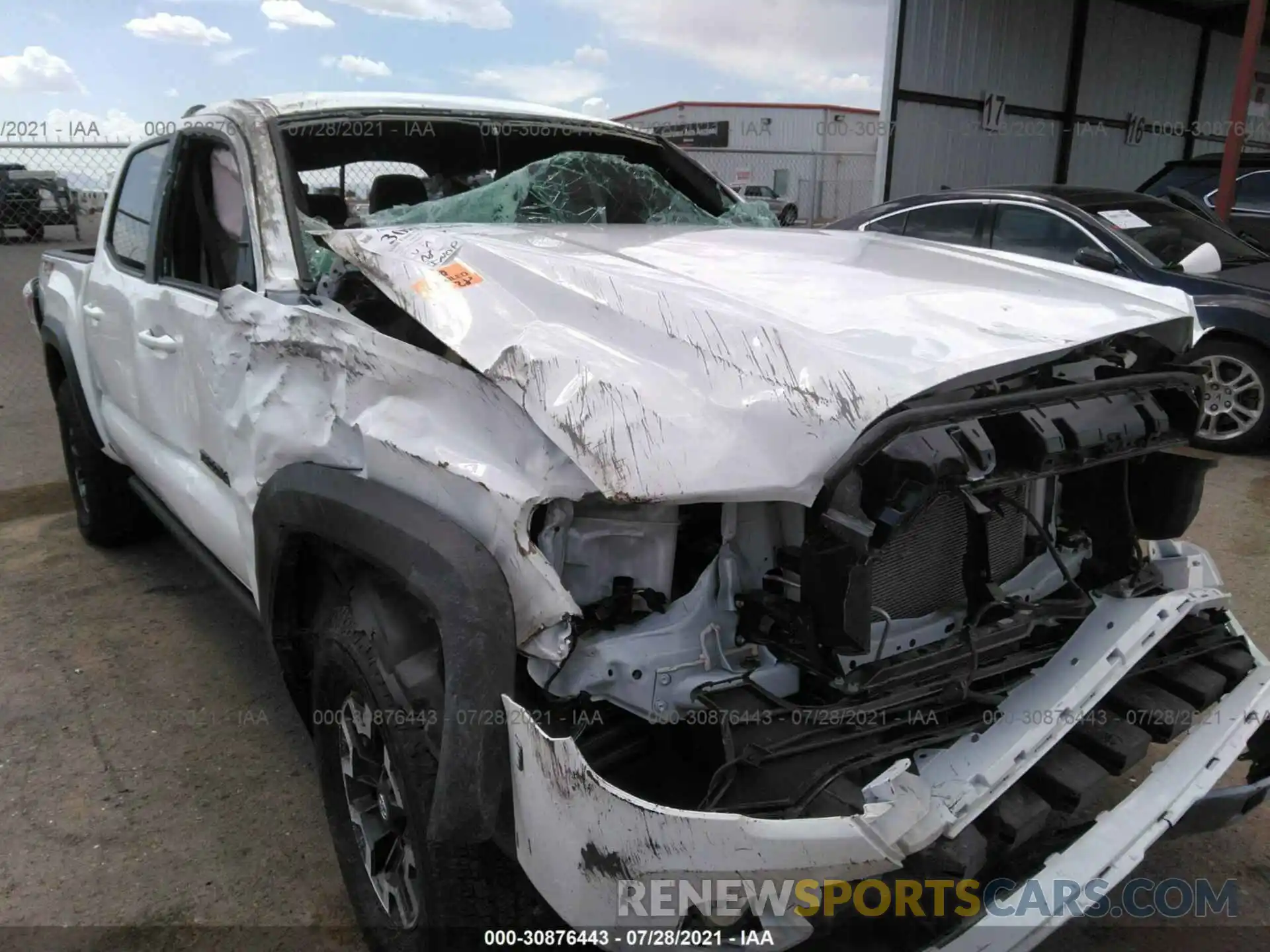 6 Photograph of a damaged car 5TFCZ5AN9MX267354 TOYOTA TACOMA 4WD 2021