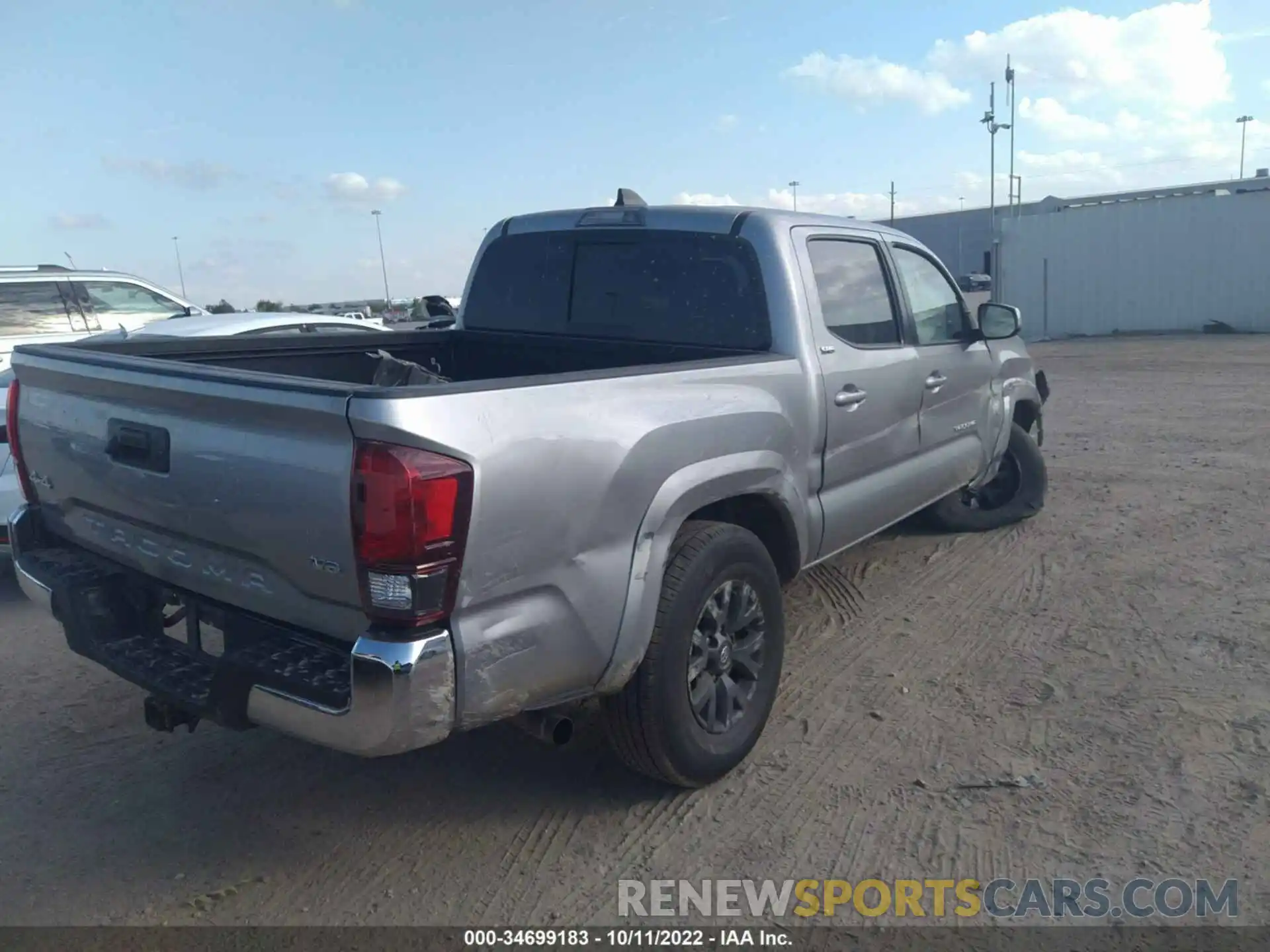 4 Photograph of a damaged car 5TFCZ5AN9MX268939 TOYOTA TACOMA 4WD 2021